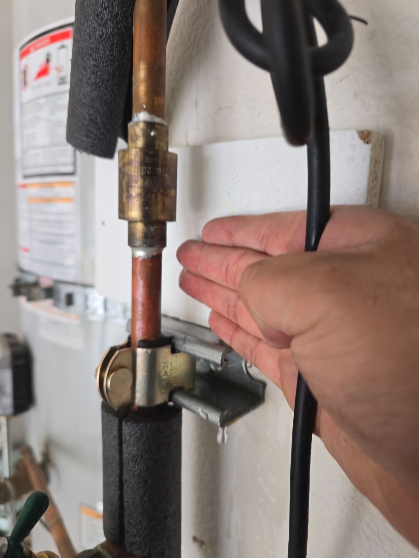 Fixing Water Leak by Us Plumbing