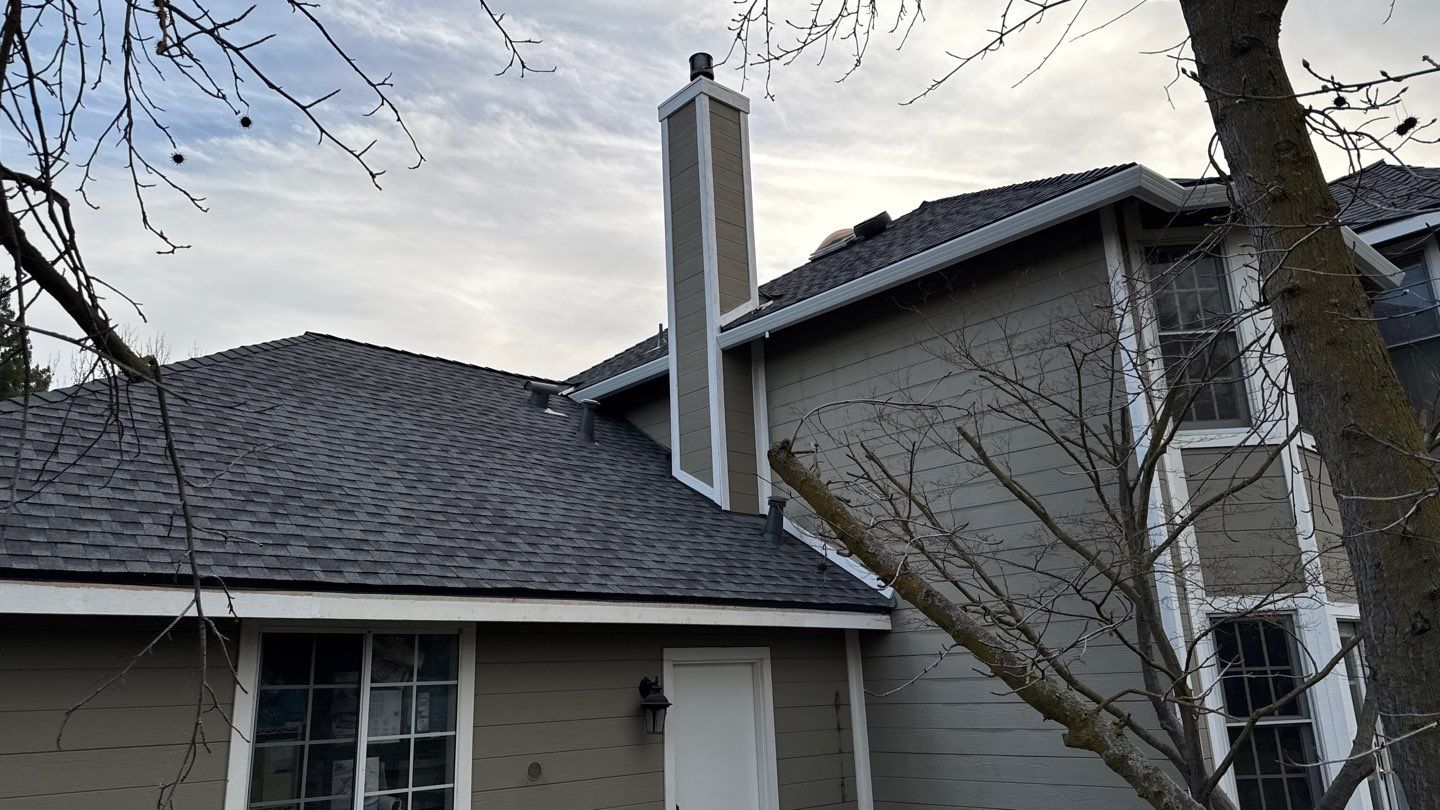 New shingles and gutters using GAF Timberline HDZ shingles and aluminum gutter by Straight Edge Roofing Inc