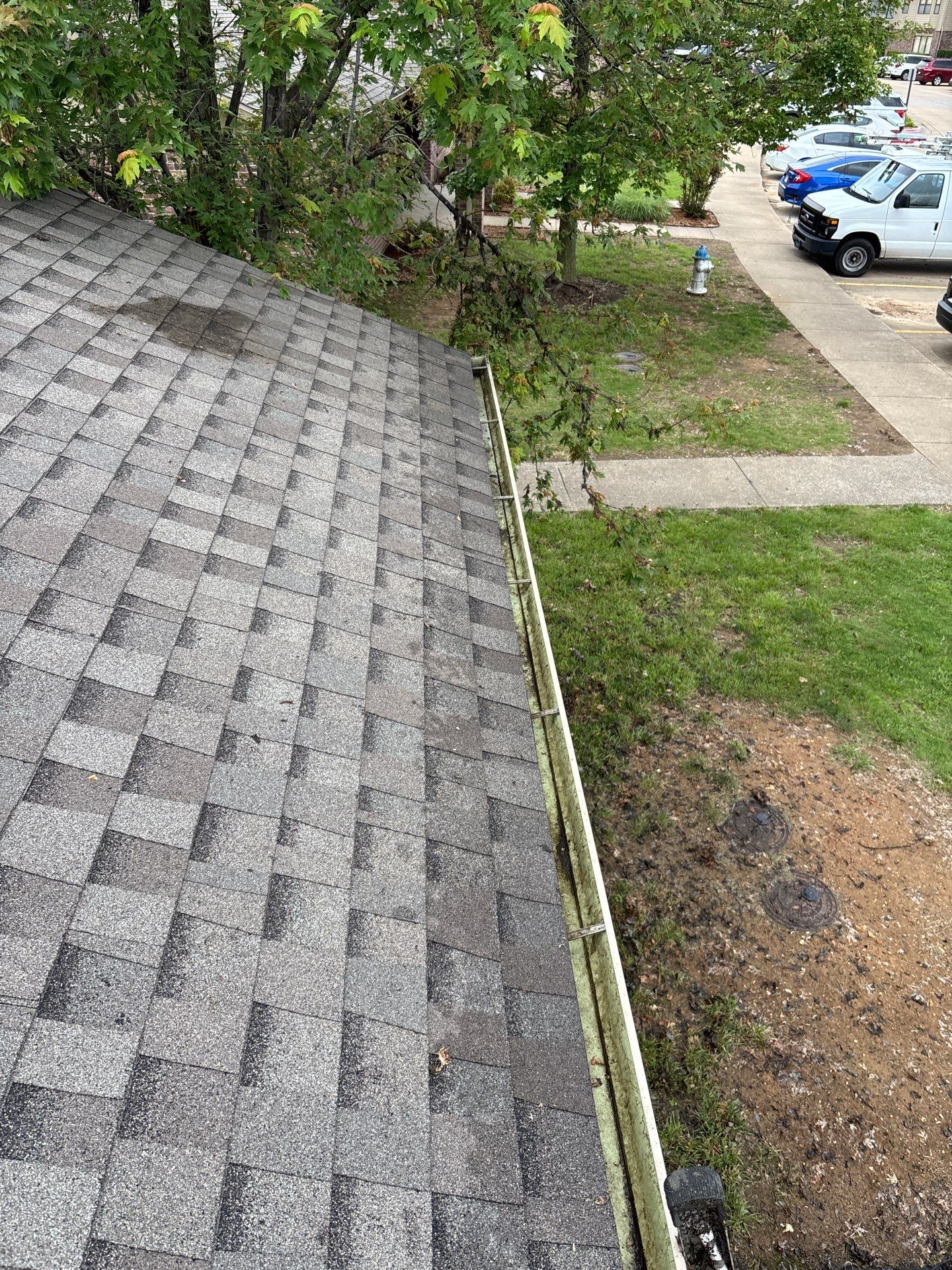 Commercial gutter cleaning Fayetteville after photo with clean gutters