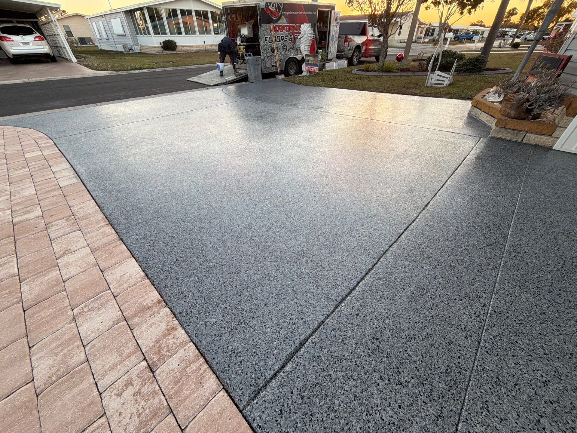 Driveway Transformation: Nightfall Flake System with Full UV & Moisture Protection by Performance Floors & Coating