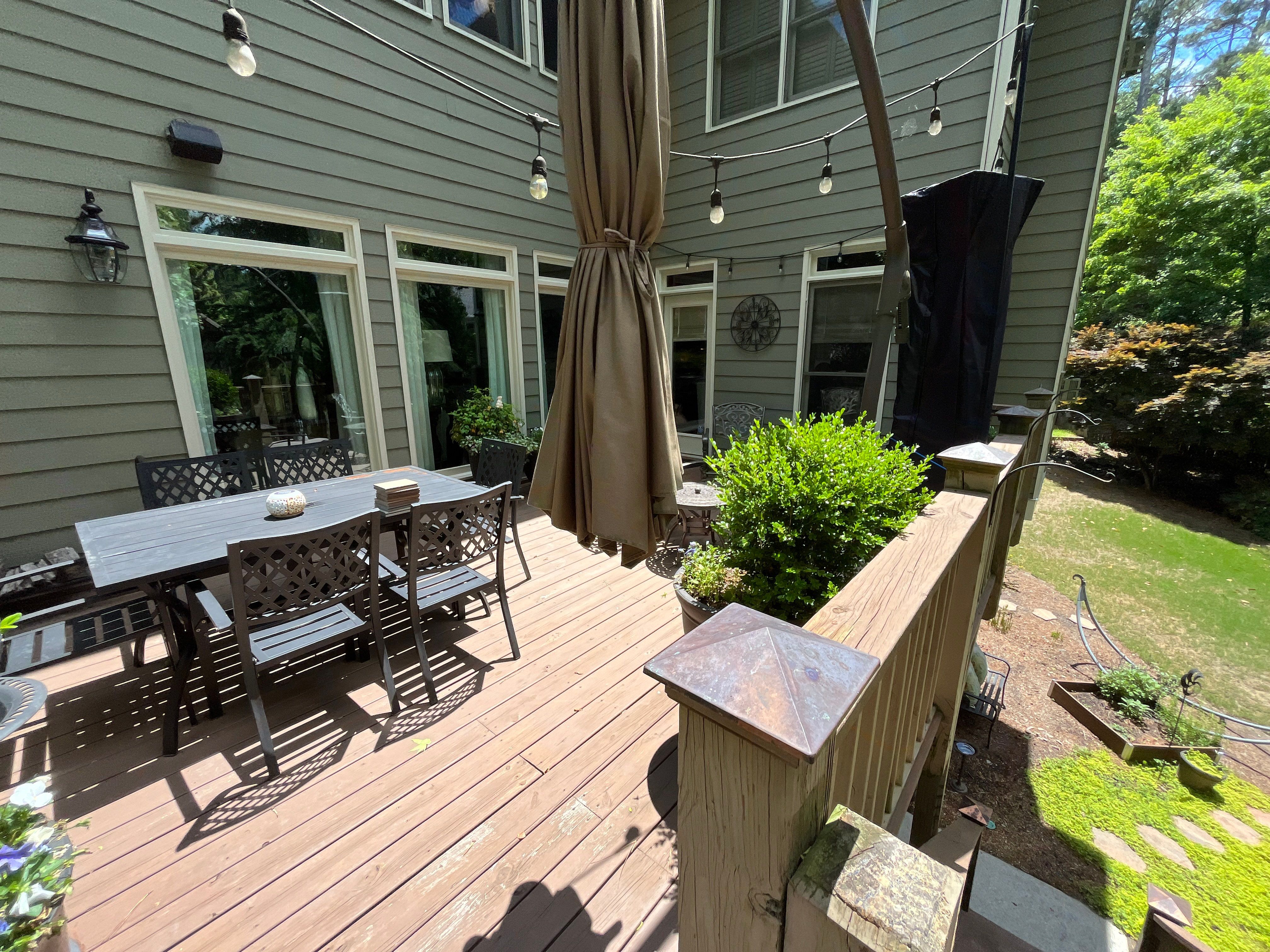 Tucker, GA Covered Porch Build and Deck Replacement using Deckorators Voyage Series Decking by Nelson Exteriors 