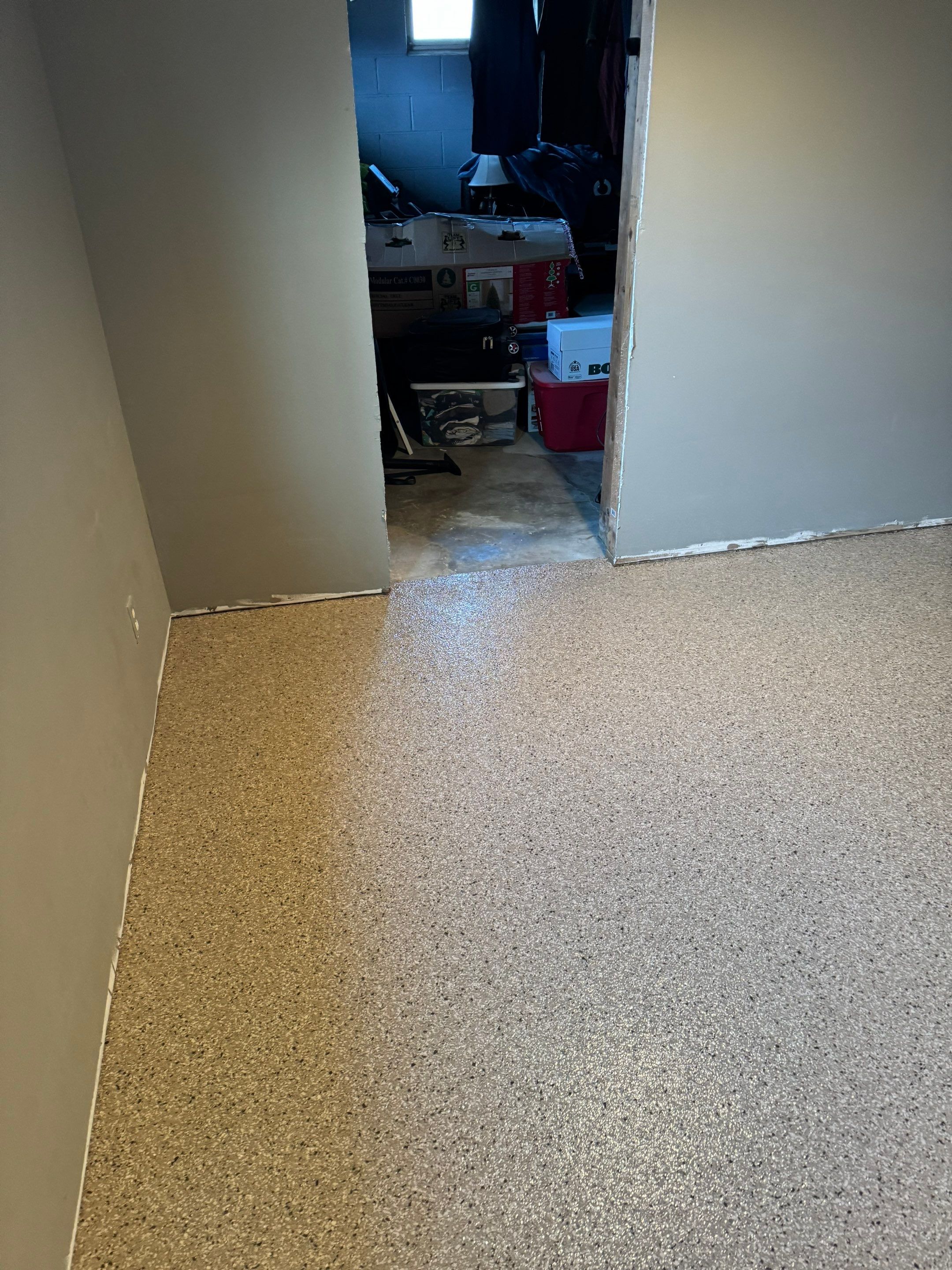 Custom Multi-Fleck Epoxy Floor Coating for Residential Basement by Select Painting, Coatings & Garage Cabinets