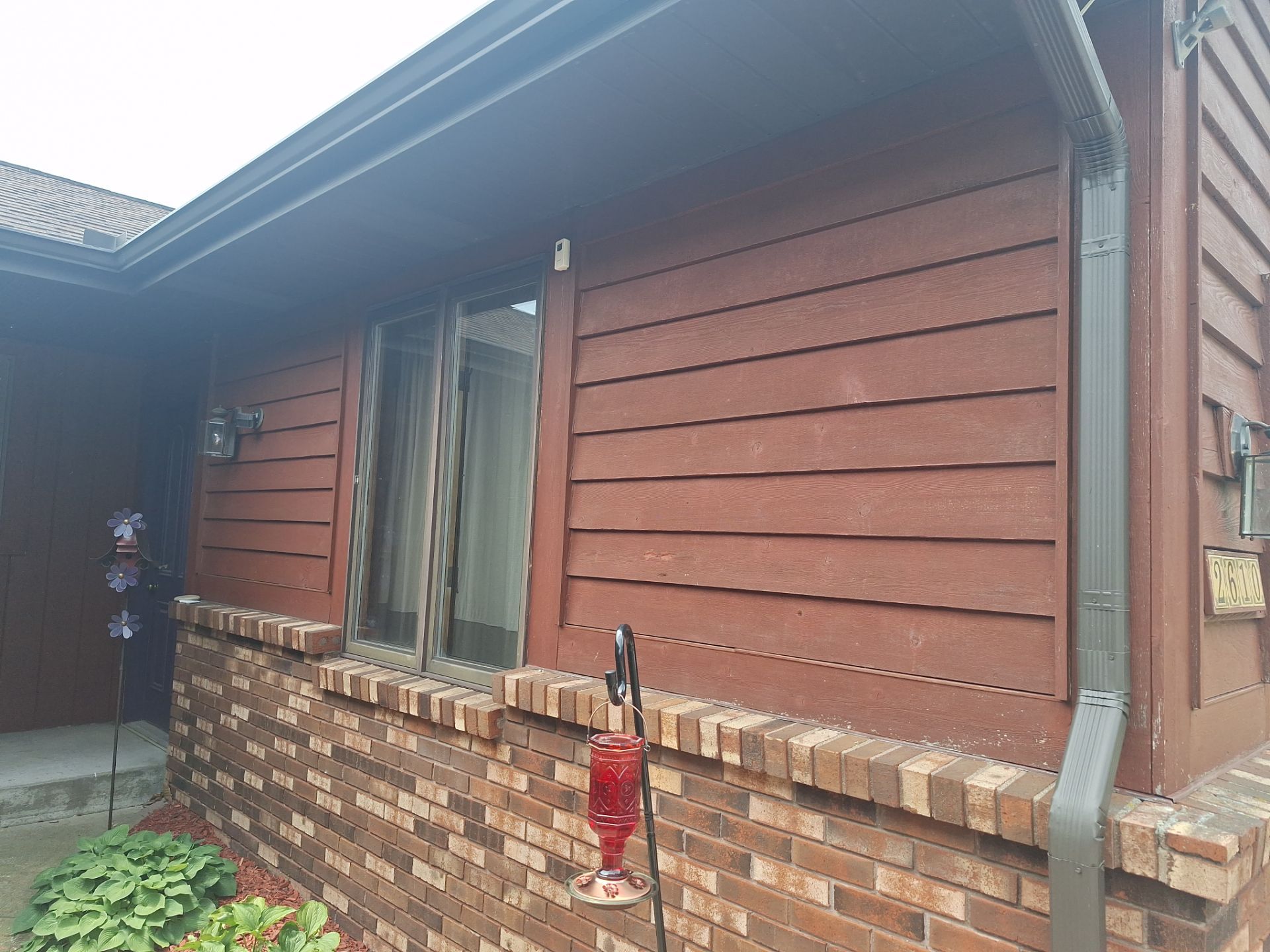 Front of home and garage staining by Gordon Painting