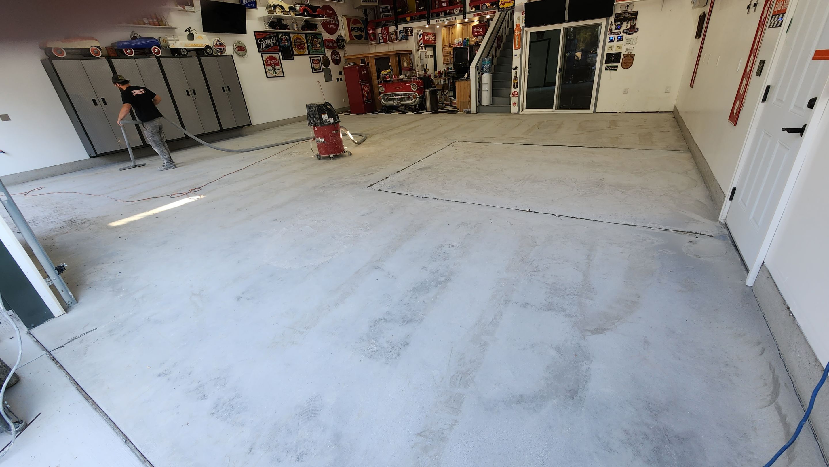 Garage Transformation using Domino with Blue by Croc Coatings, LLC