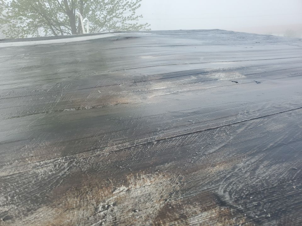 Residential Roofing Installation using 60 mil rubber roof  by Nitro Roofing and Construction