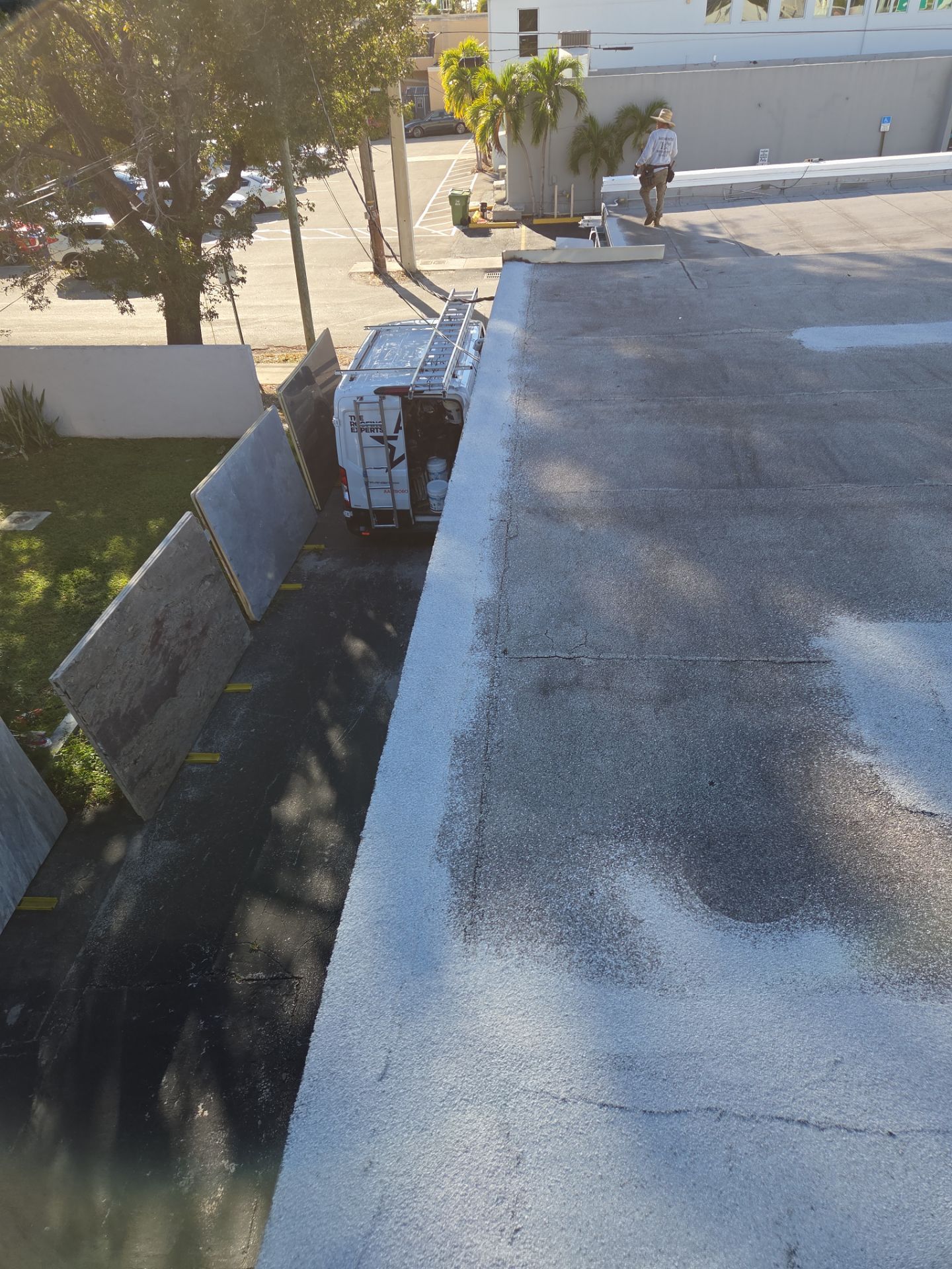 Commercial Flat Roof Restoration Using Silicone Coating in Hallandale Beach by Aastro Roofing