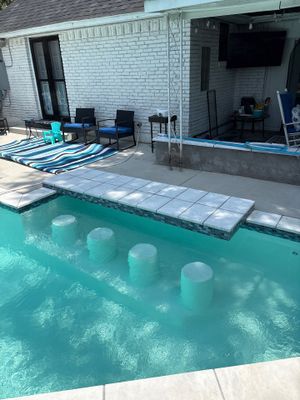 Modern Geometric Pool with Tanning Ledge