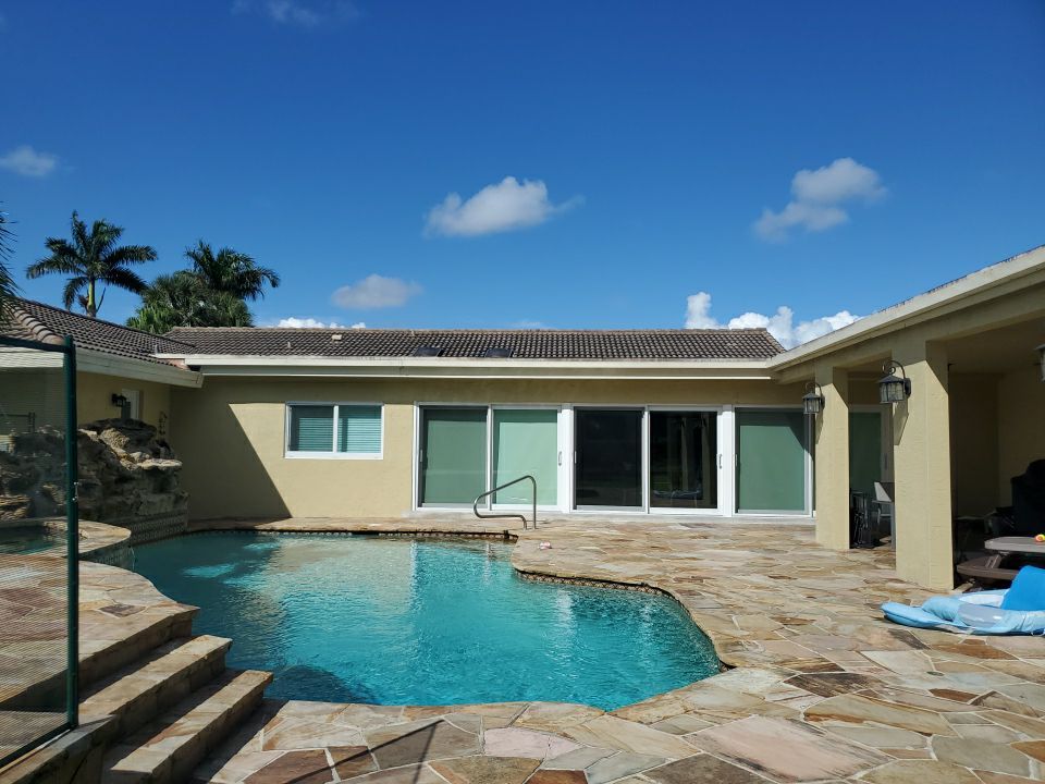 Residential Roofing Installation using 1" Nail strip metal roof by BLUES BROTHERS CONSTRUCTION CORP