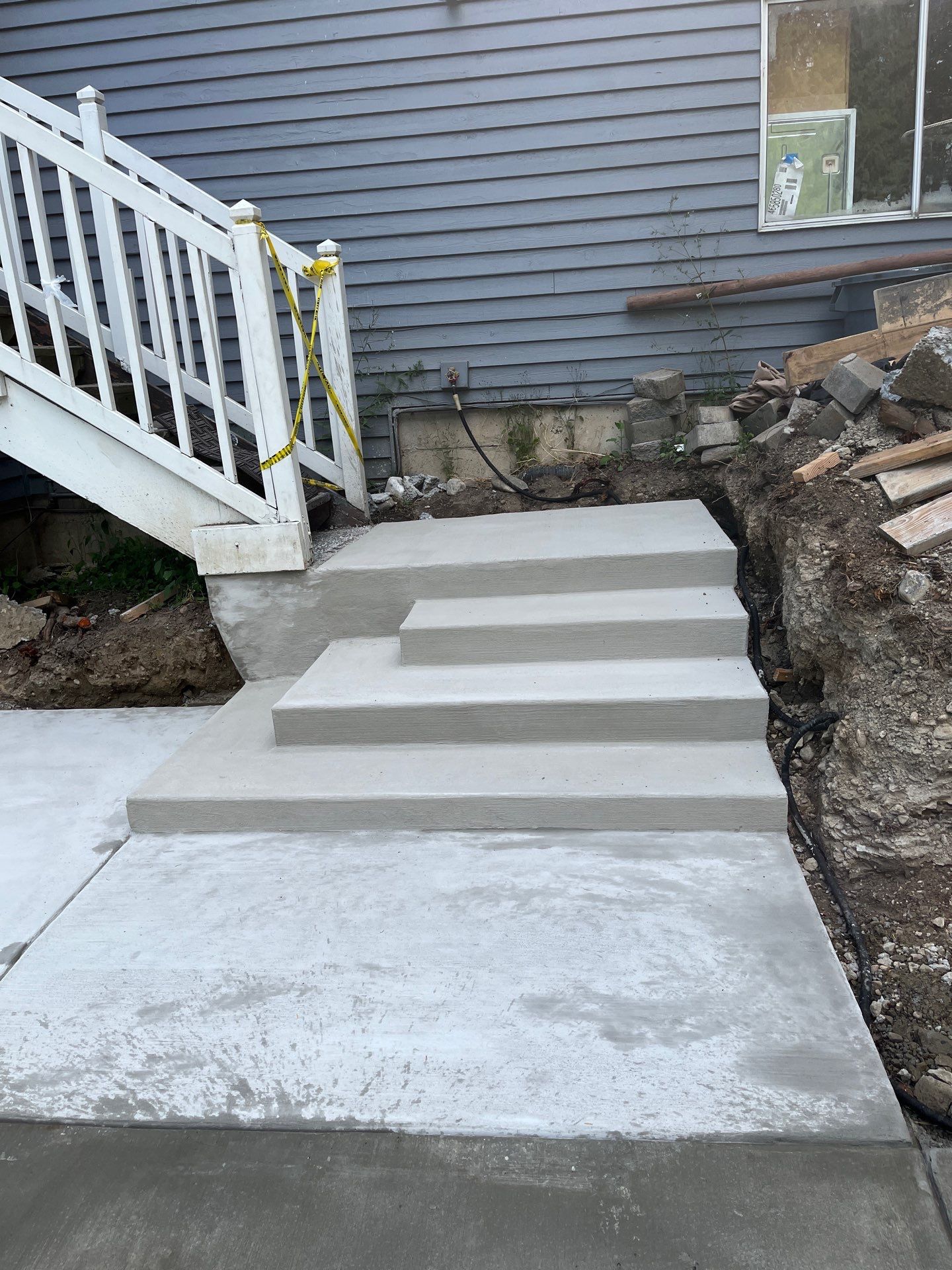 Concrete Back Patio Makeover  by Jireh Asphalt & Concrete Inc 