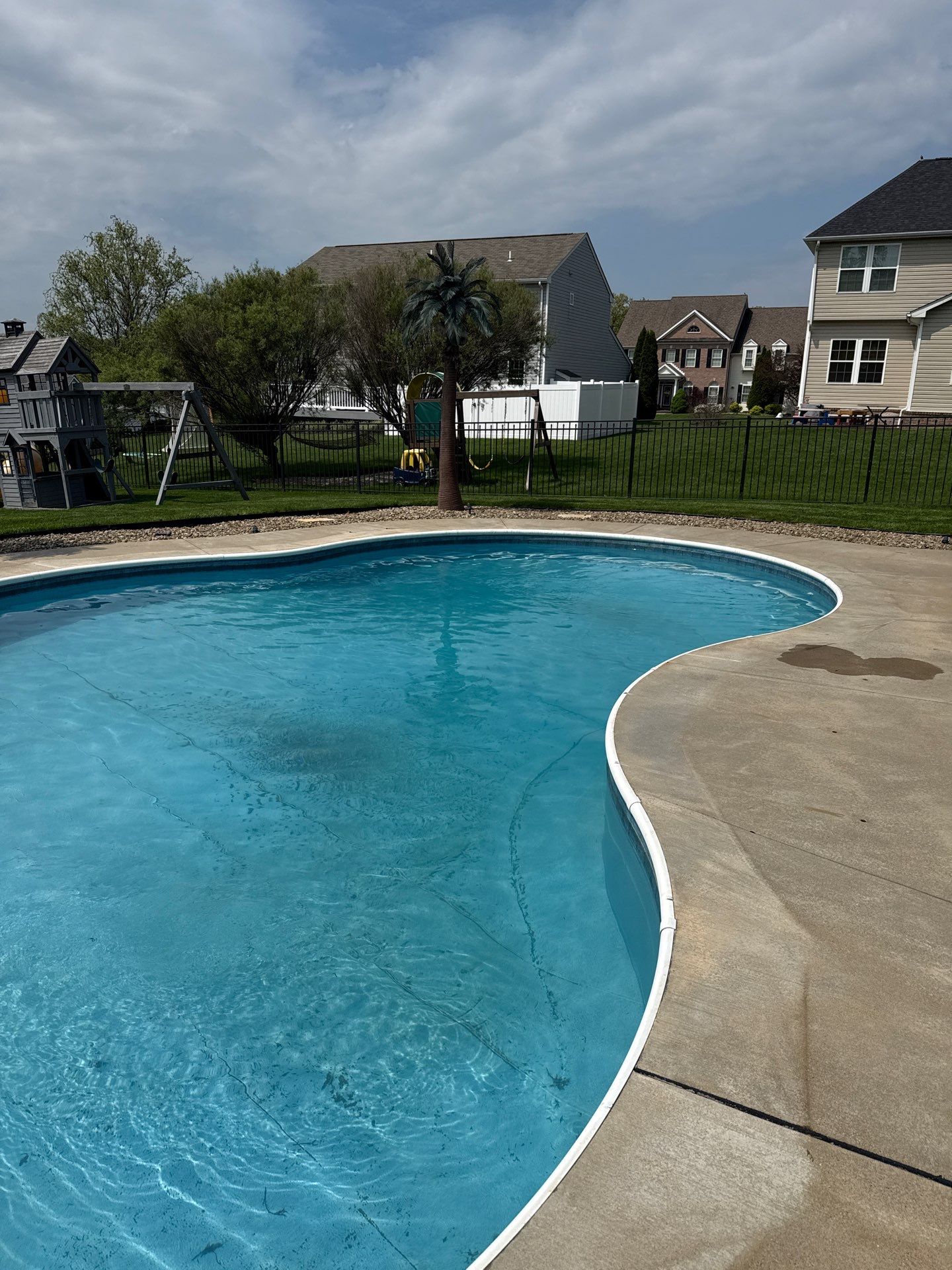 Twilight Pool Deck / Patio Project in Beaver falls by Floors in a Day, Inc