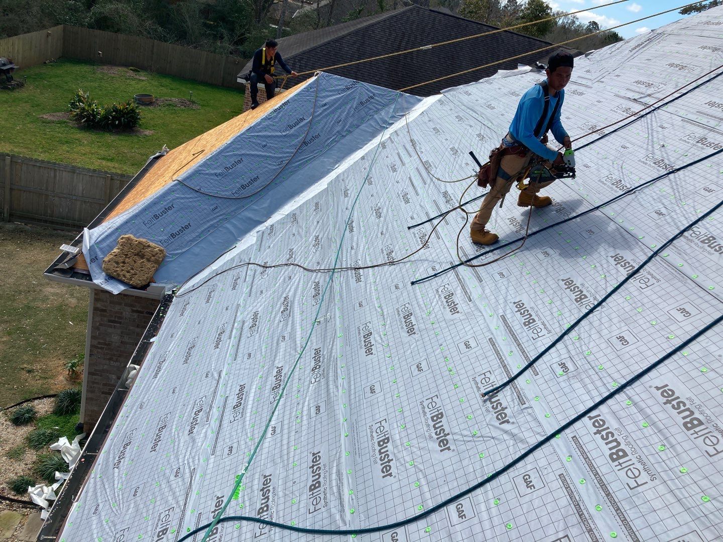 Residential Roofing Installation using Roof Replacement by American Roofing & Construction LLC