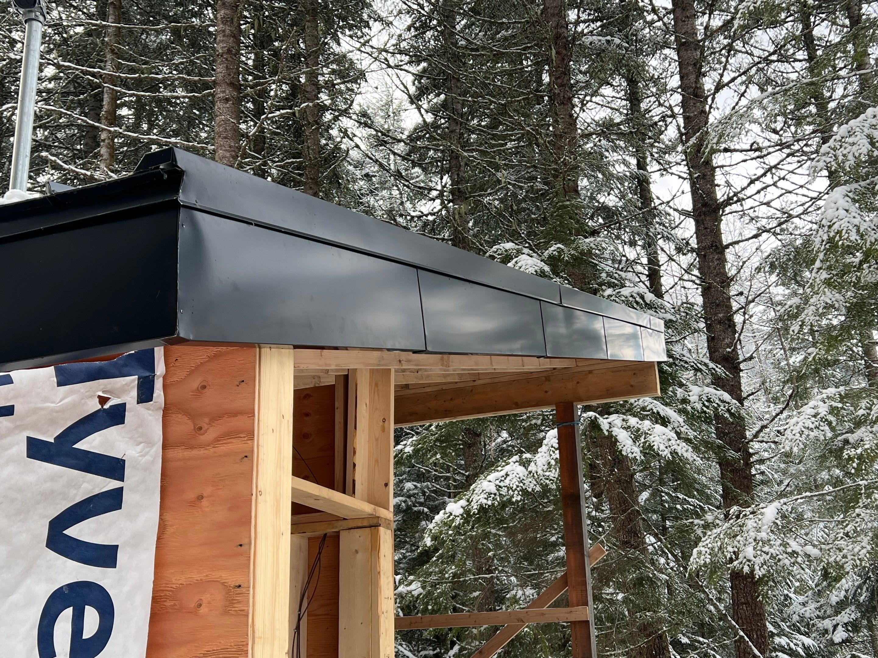 Residential Roofing Installation using 12" Prolok metal  by Top Notch Roofing Inc