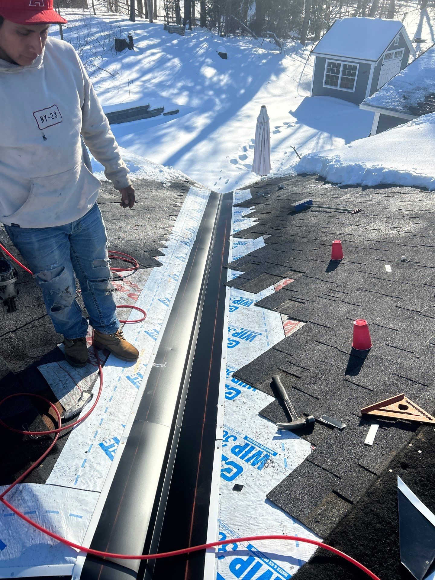 Ridge Cap Replacement & Black Metal Valley Installation in Chelmsford, MA by Mighty Dog Roofing of Greater Middlesex County