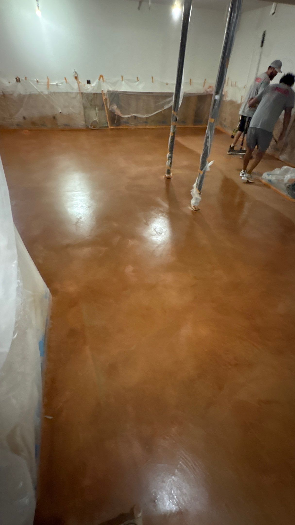 Basement Floor Remodel with Haven Reno KC by Big Red Decorative Concrete, LLC