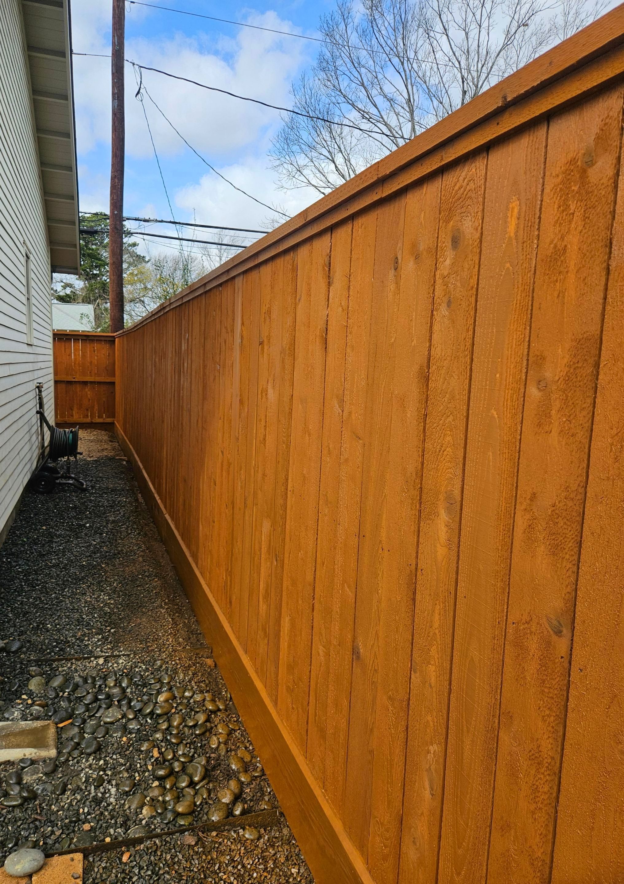 Durable Fence & Gate Installation with Premium Stain by Tim's Fences