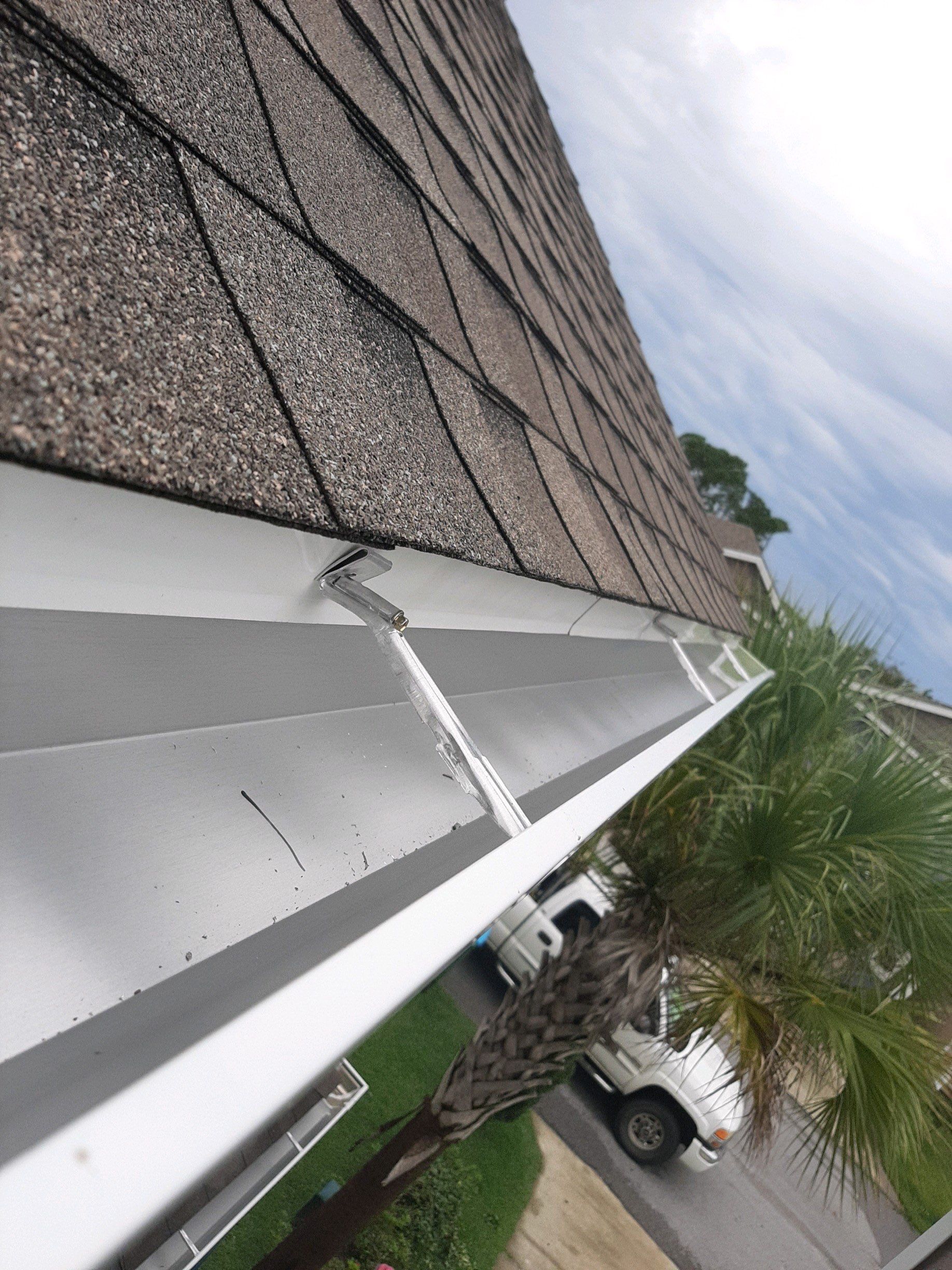 Seamless Gutter Installation using White K-Style Gutters by Gutter Professors