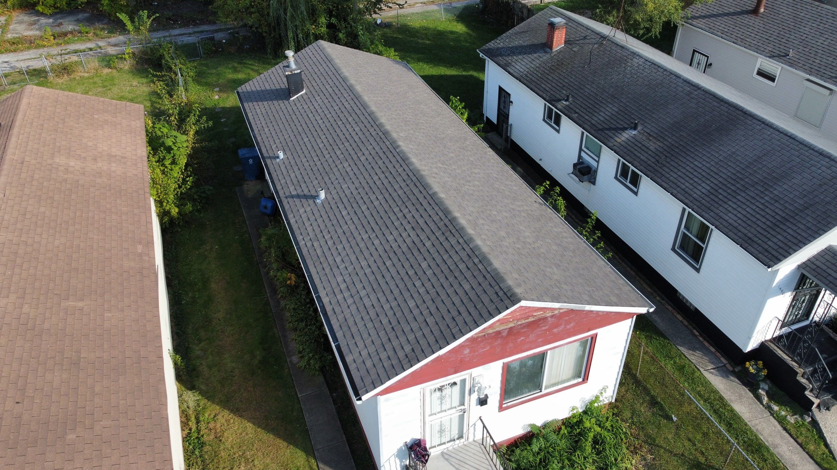Two Roof Replacements  by HighRise Exteriors