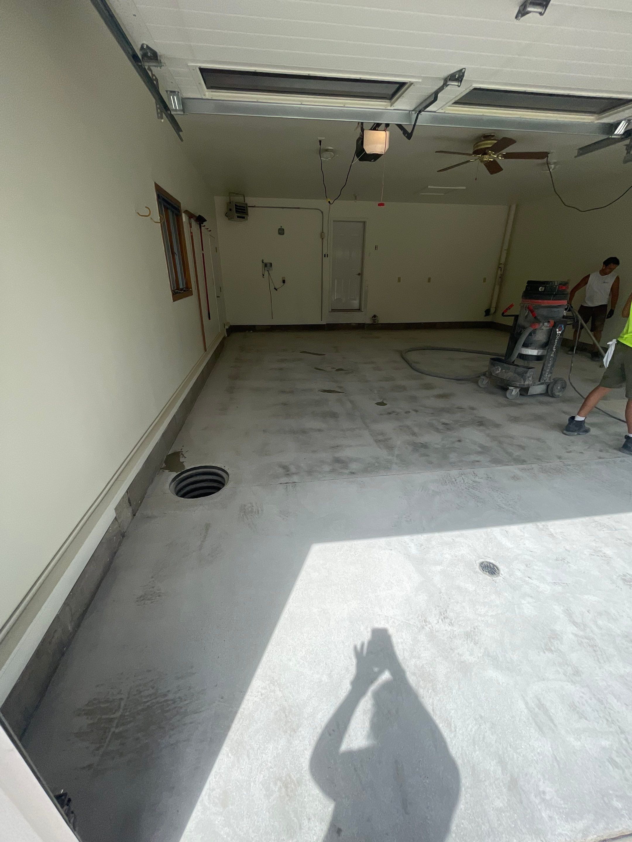 Madison Garage Concrete Coating with Feather Grey Speckle Finish by Select Painting, Coatings & Garage Cabinets