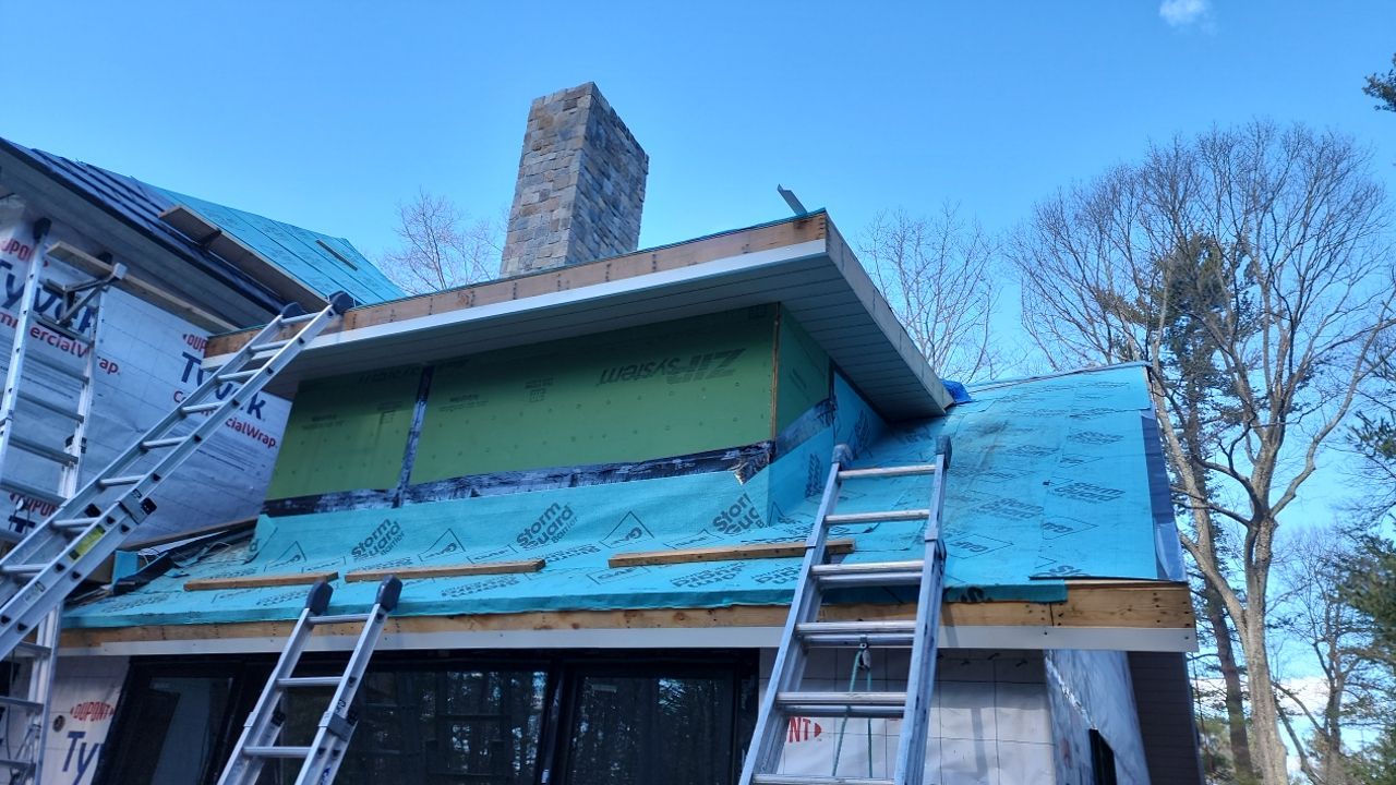 Siding in Weston,  MA by UBrothers Construction