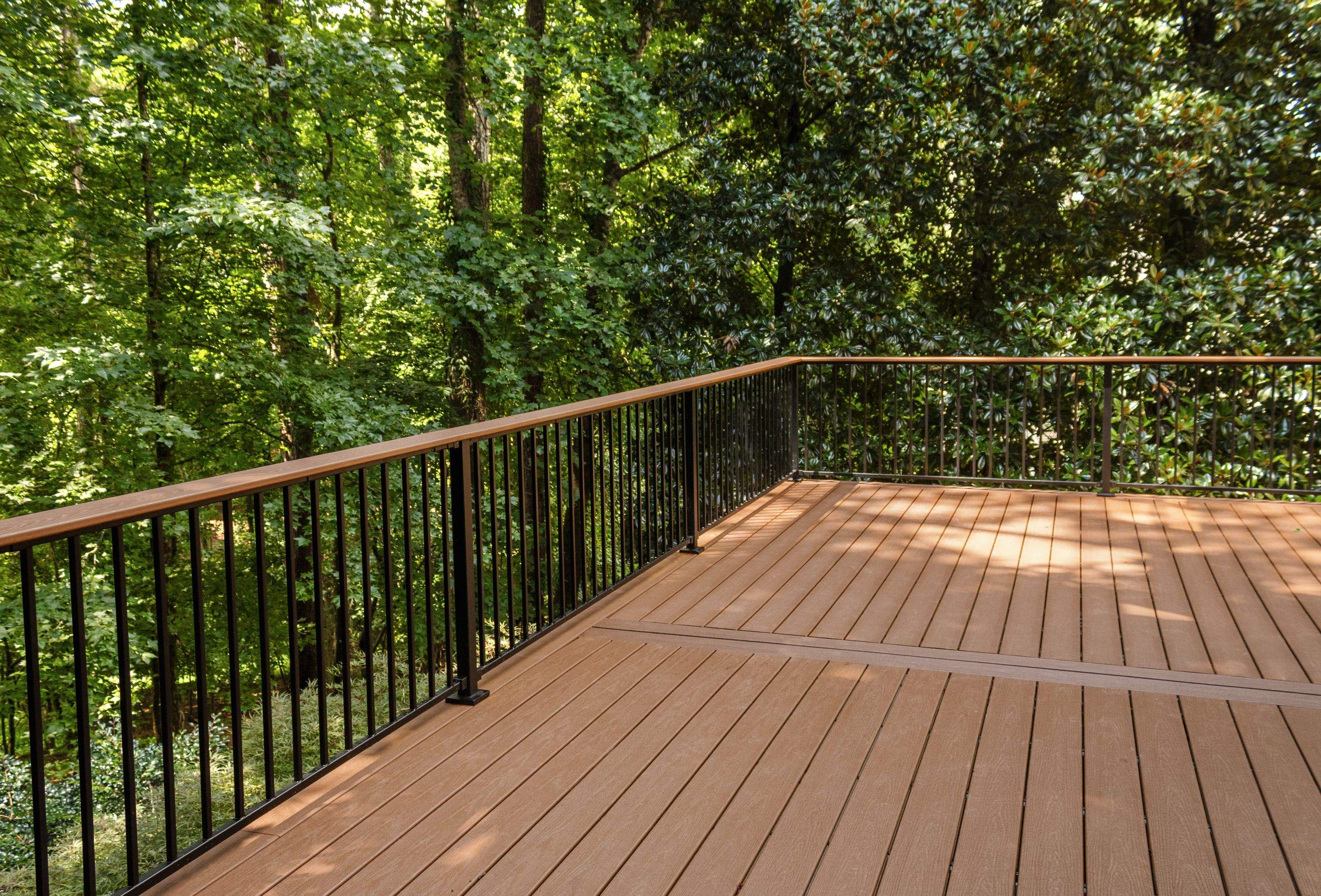 Full James Hardie Siding Replacement and Trex Deck Resurface in the Saddle Color by Nelson Exteriors 