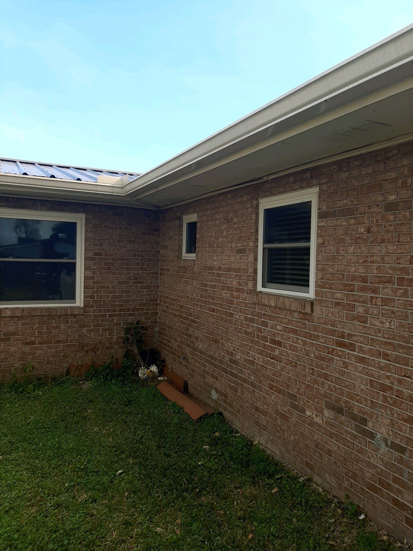 Soffit and Fascia Installation Using White Vinyl Soffit by Gutter Professors