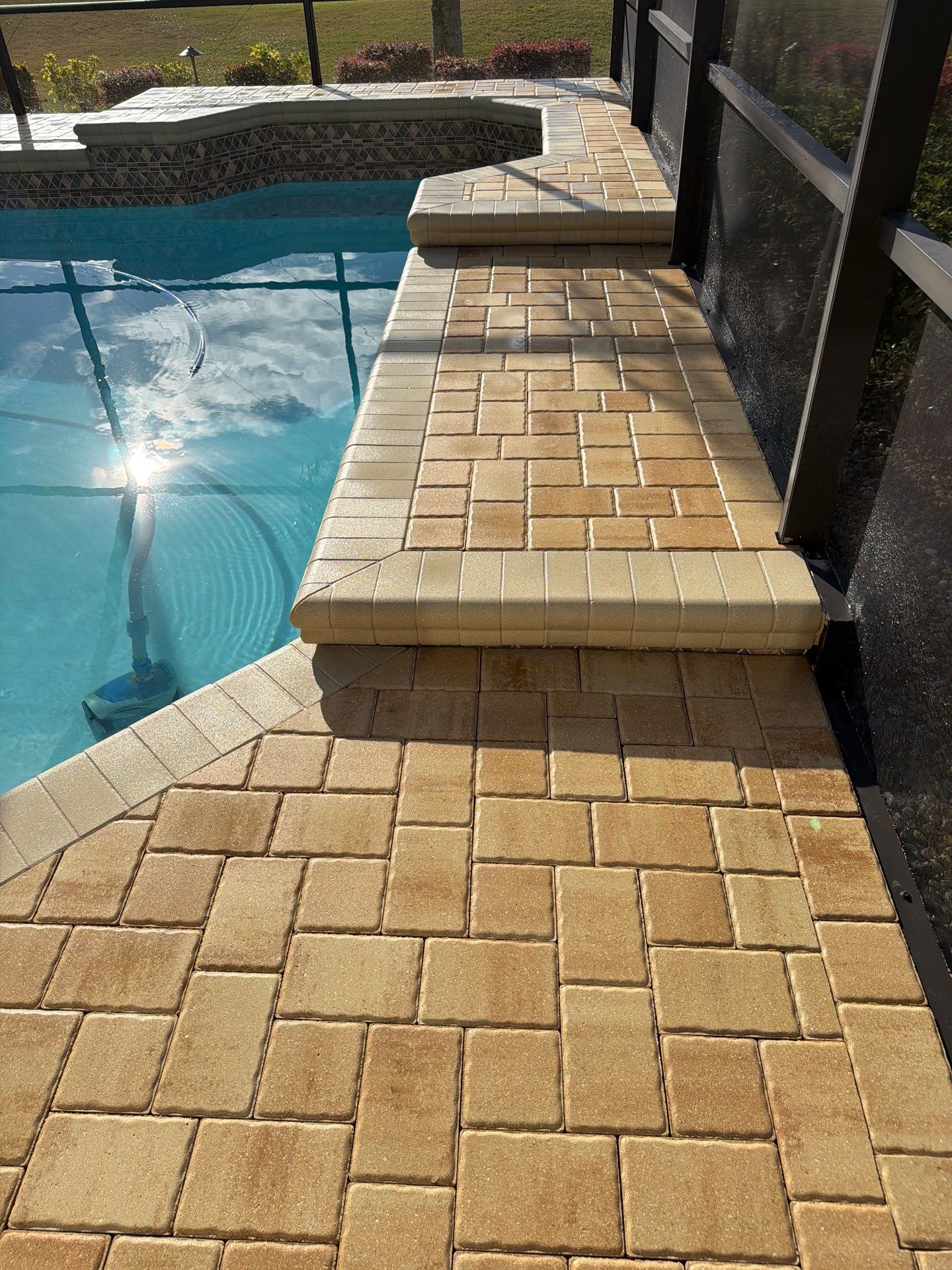 Custom Tan Paver Pool Deck and Patio in Sun City Center by Supreme Paver Experts