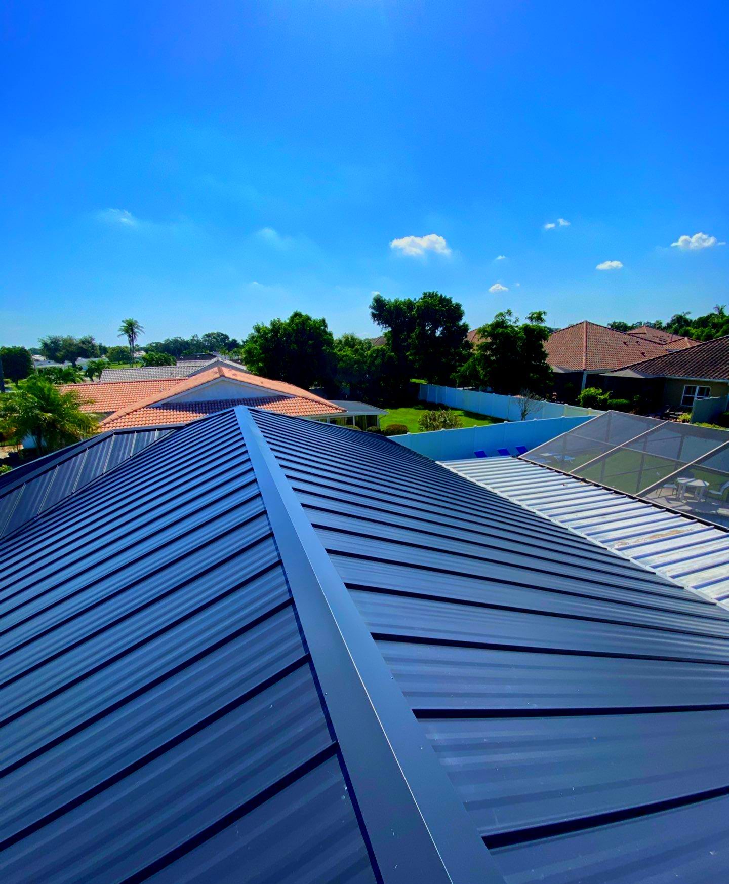 Metal Roofing System by Rooster Roofing, LLC