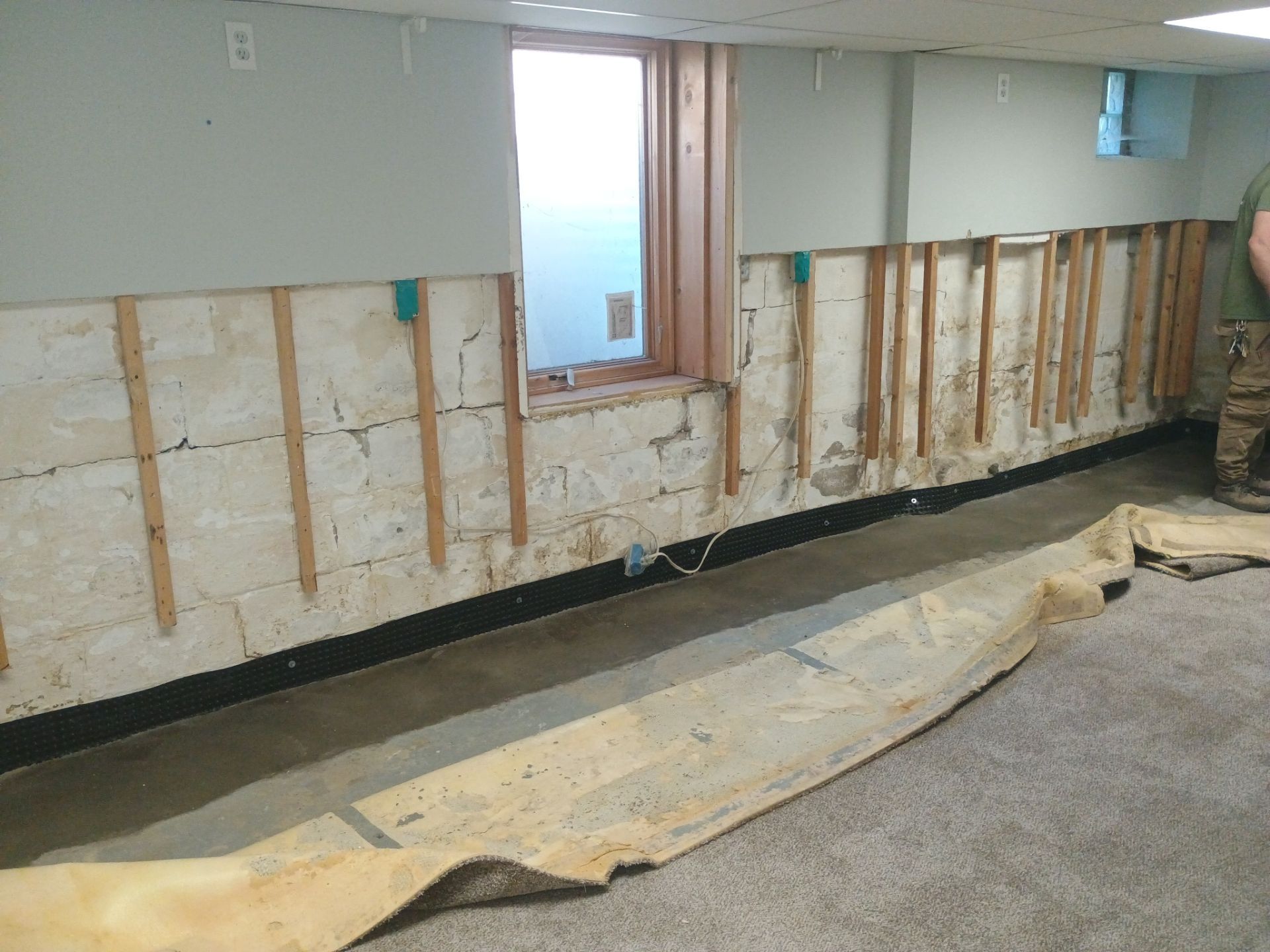 Interior Drain Tile Installation in South Minneapolis by Waterproofing Northeast
