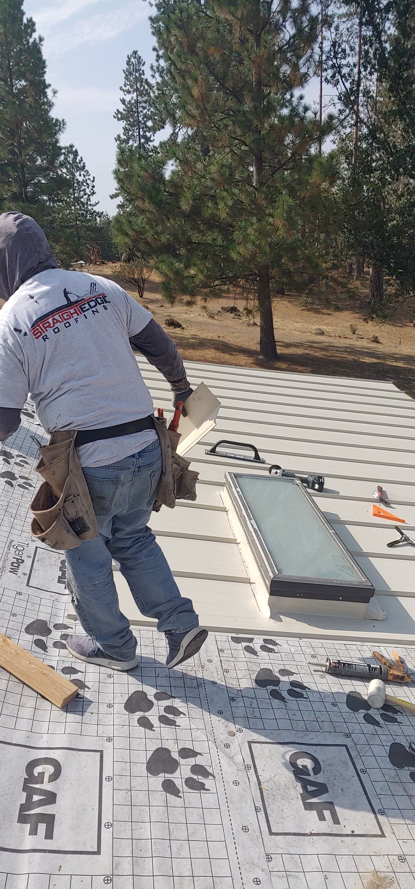 Residential Roofing Installation using Standing seam metal roofing system by Straight Edge Roofing Inc