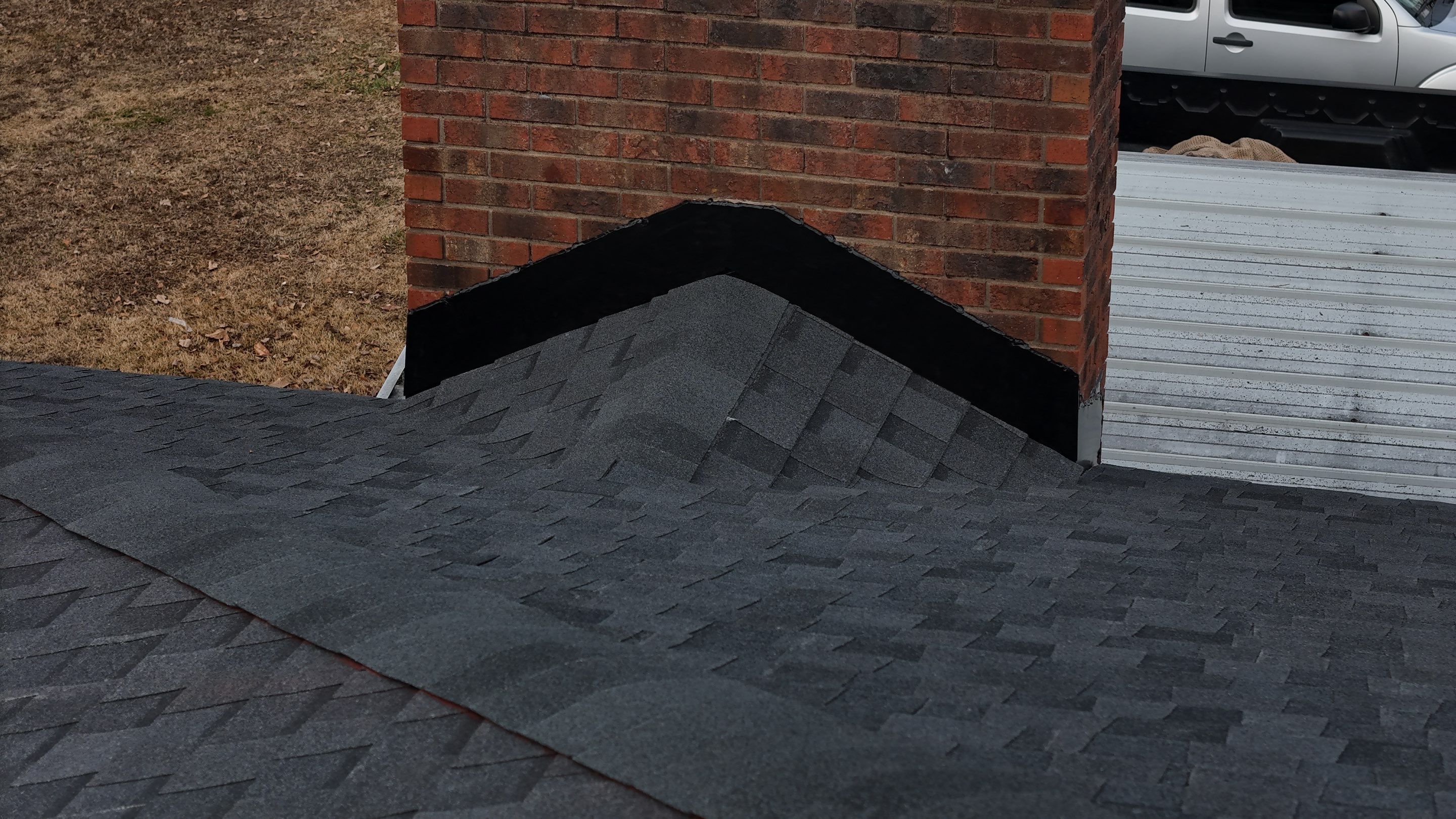 CertainTeed Landmark Moire Black Architectural Shingles on Inman SC Brick Ranch Home by Roofers LLC
