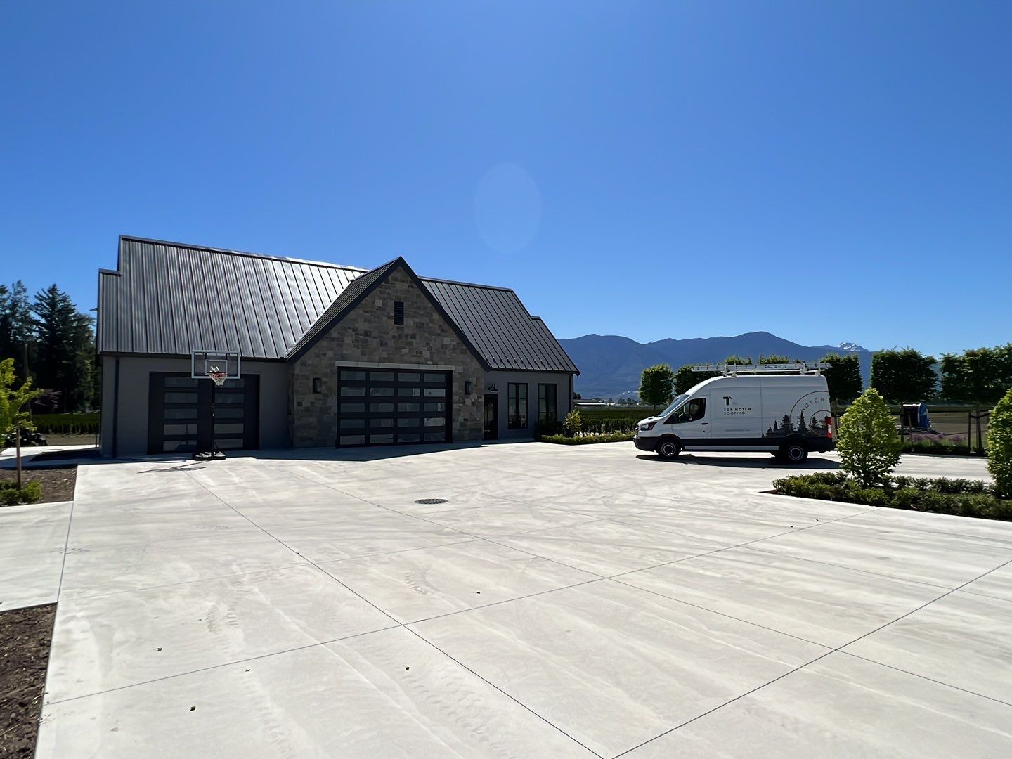 Residential Roofing Installation using 12" Prolok metal  by Top Notch Roofing Inc