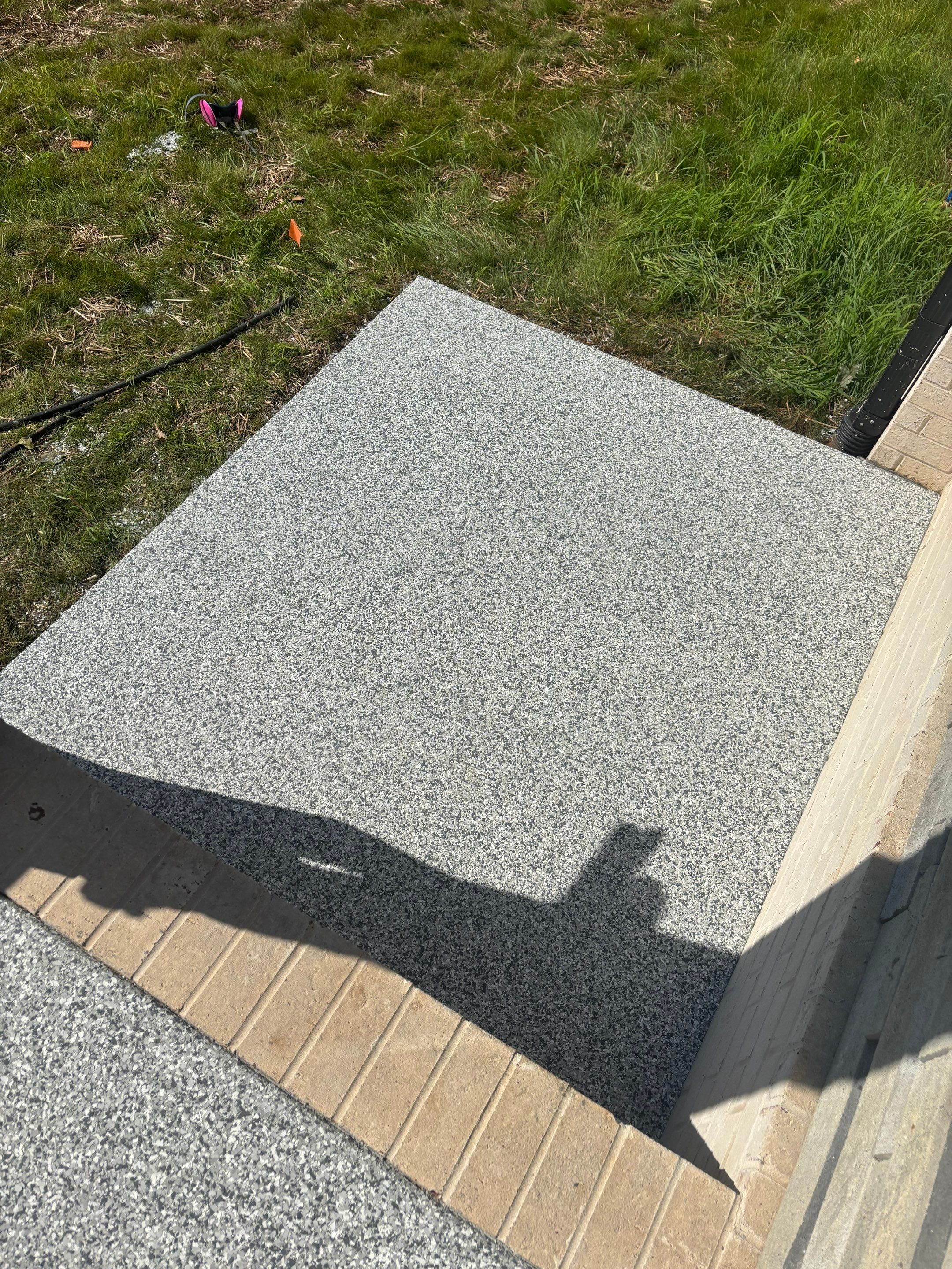 Porch & Garage Using Tidal Wave & Gravel  by Elite Floor Solutions