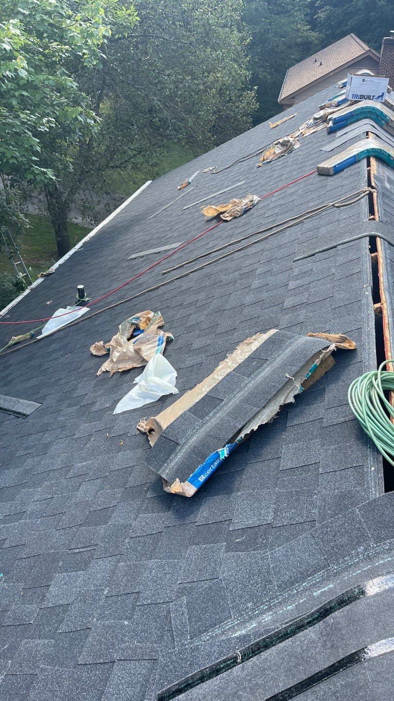 Roof replacement by wind damage by Just Brilliant Restoration JBR