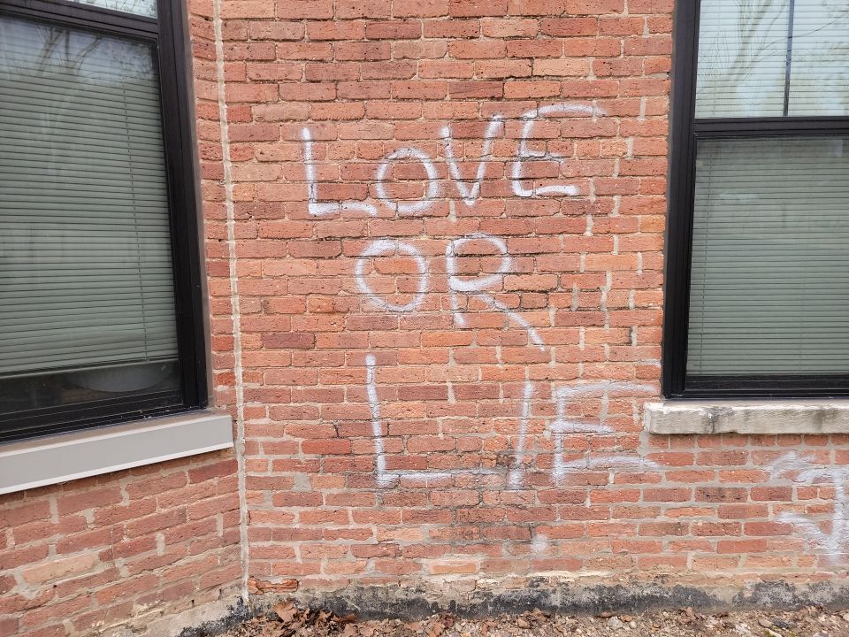Graffiti removal  using Graffiti remover by Northern Power Washing LLC.