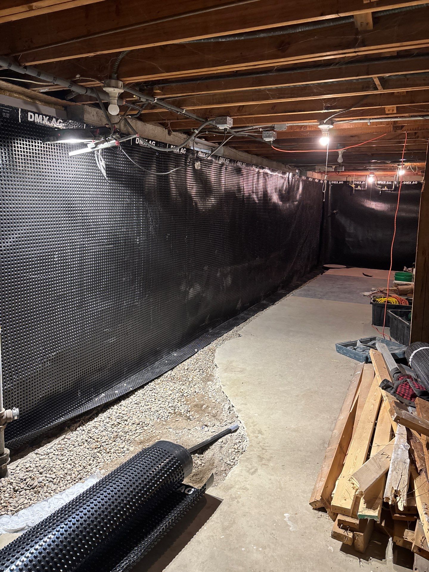Interior Drain Tile & Buried Discharge in South Minneapolis by Waterproofing Northeast