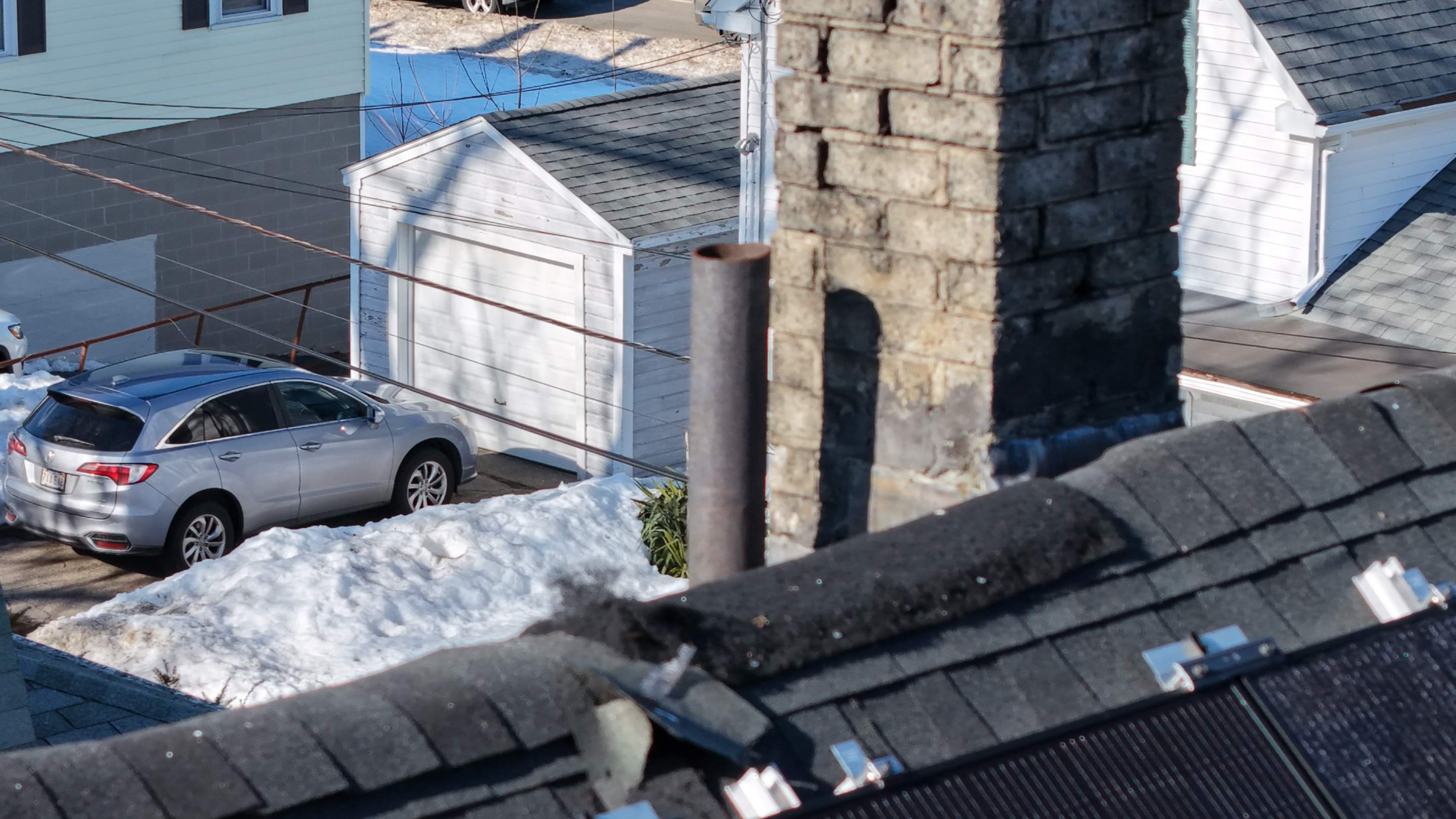 Critter Damage Repair: Ridge Vent Upgrade & Mansard Shingle Restoration by JOHNNYS PRO
