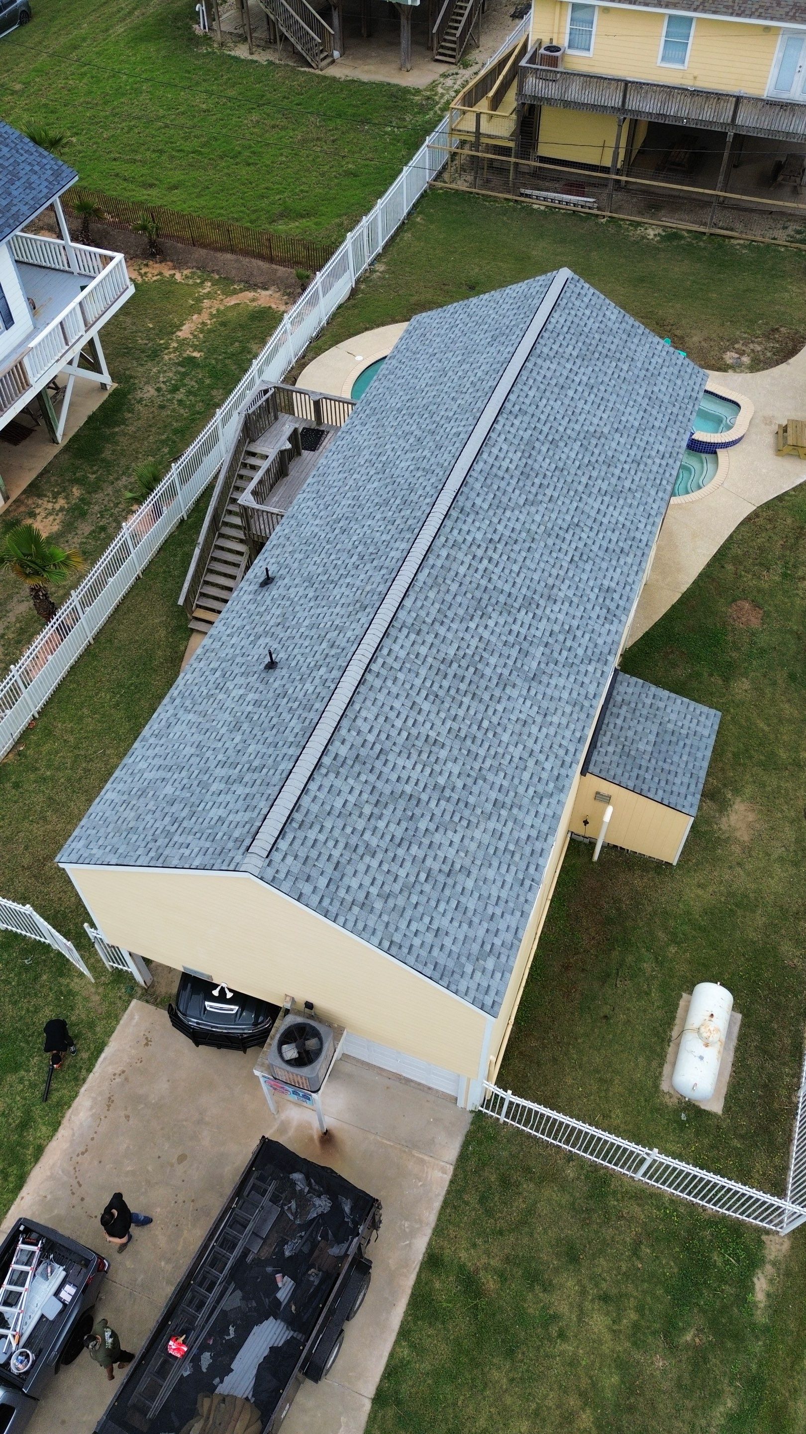 Roof Replacement using IKO Cambridge Dual Grey by CAP Roofing and Construction LLC