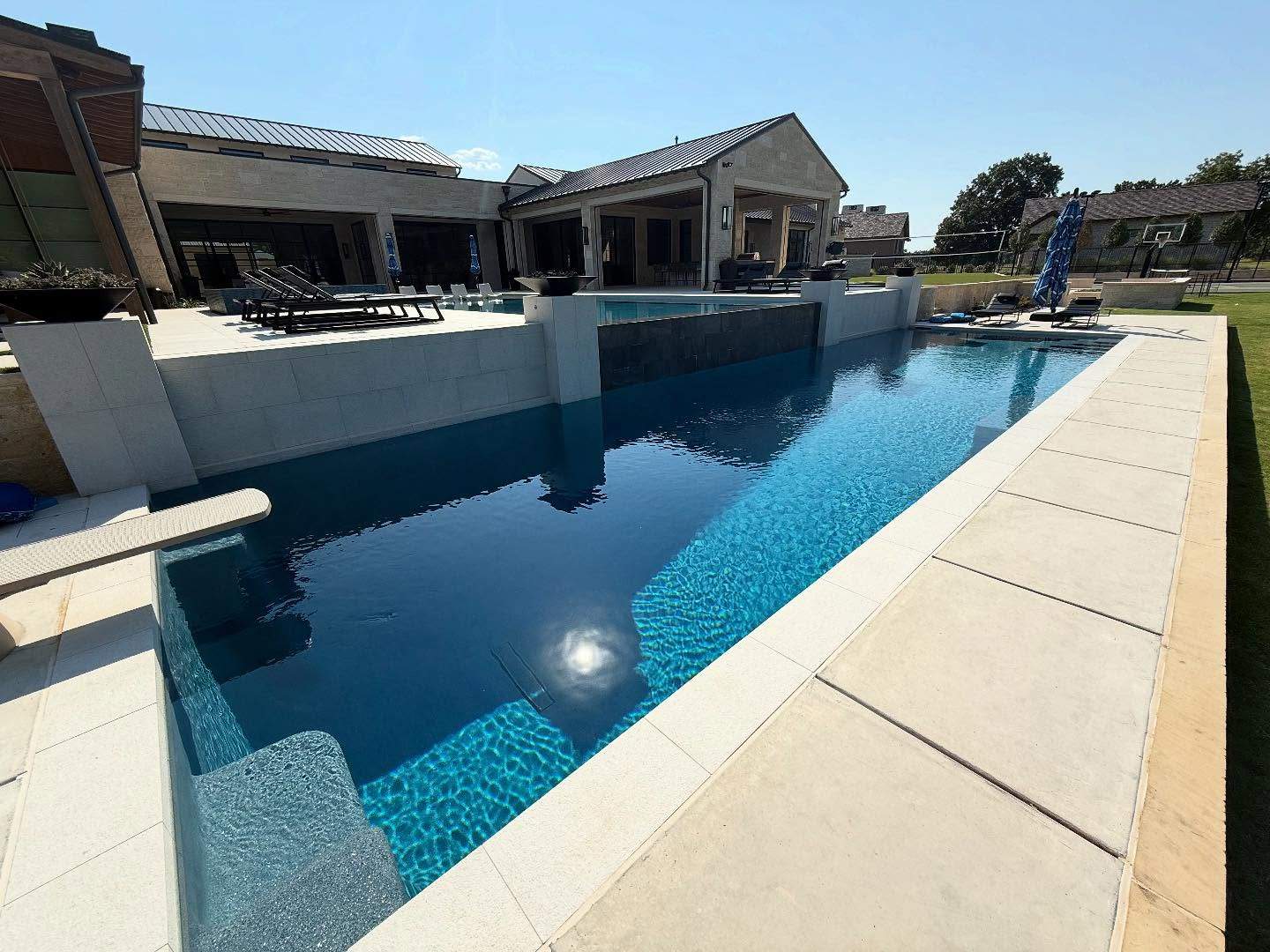 Jumbo Double Pool with Negative Edge by Pinnacle Pools and Spas - DFW