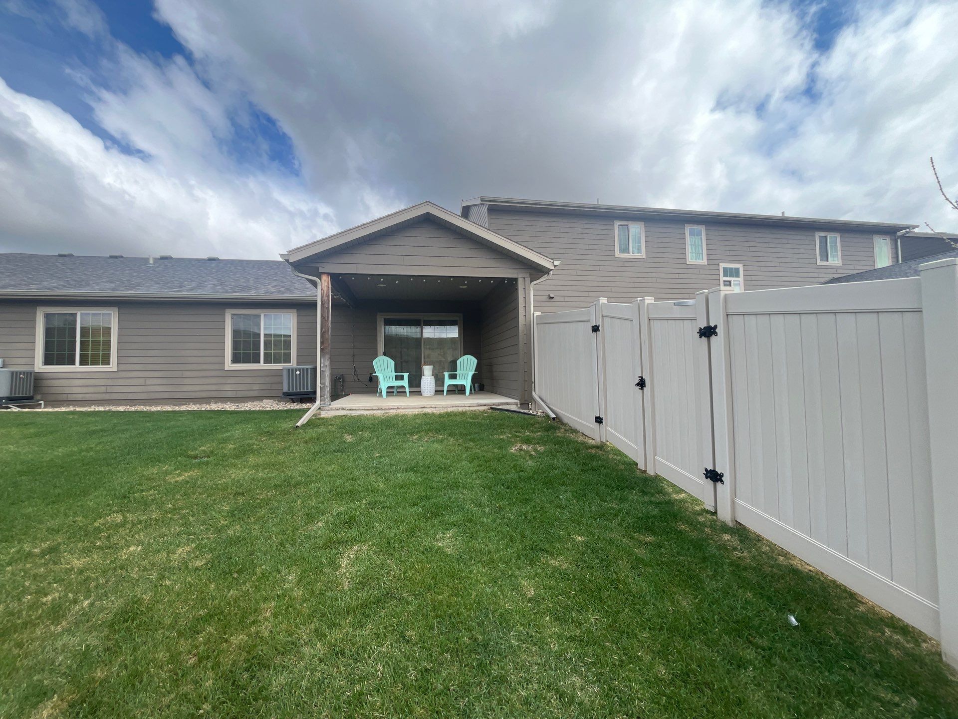 Exterior Painting for Multi-Unit Townhomes in Sioux Falls by Select Painting, Coatings & Garage Cabinets