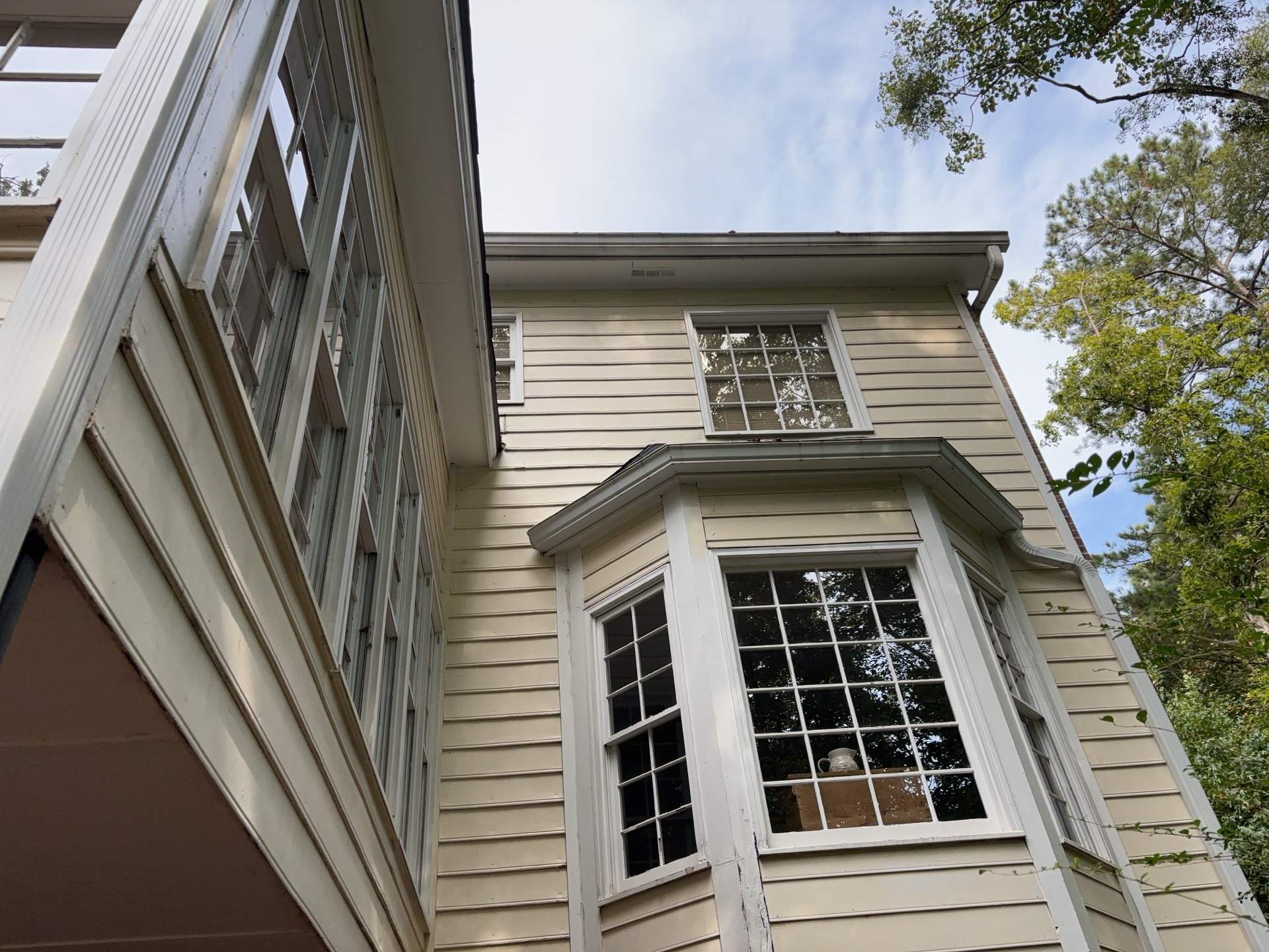 53 Window Replacements with Master 2800 Series Vinyl Replacement Windows and James Hardie Siding Installation by Nelson Exteriors 