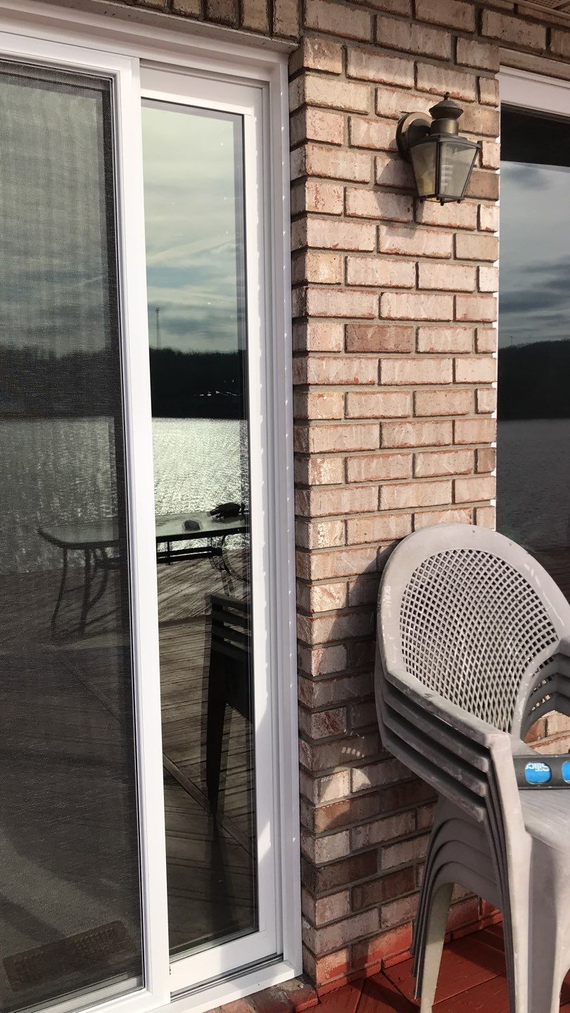Deck Refurbush and Door Replacement using Trex Decking and Railing.  Polaris Patio Doors by Secure Construction Company Inc