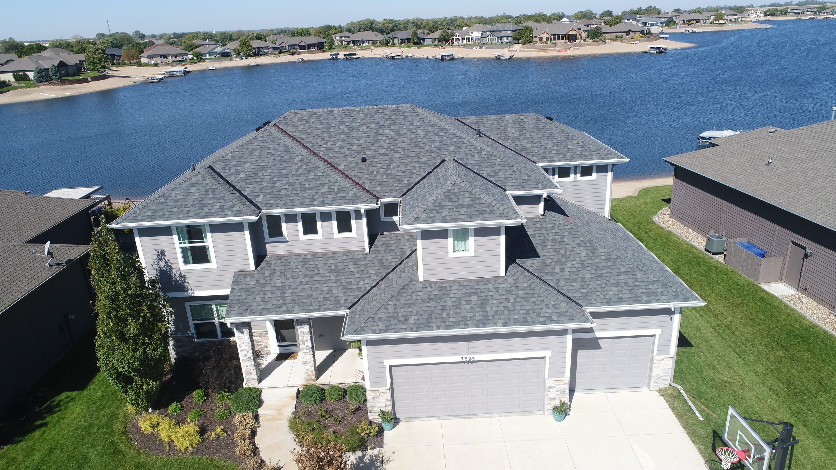Residential Roofing Installation using Asphalt Shingles by Lightning Exteriors