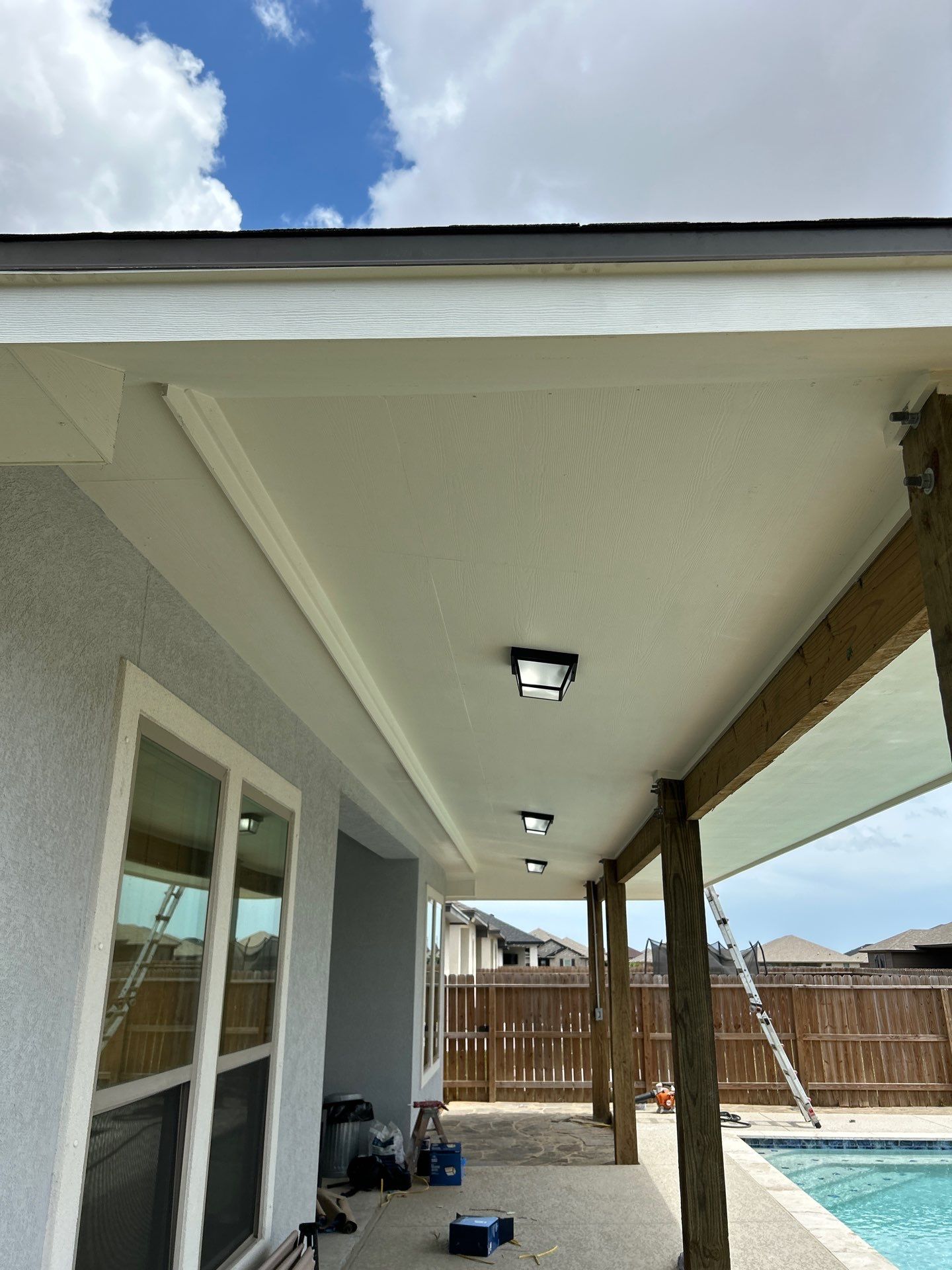 Patio Pool Cover by Bayfront Roofing and Construction