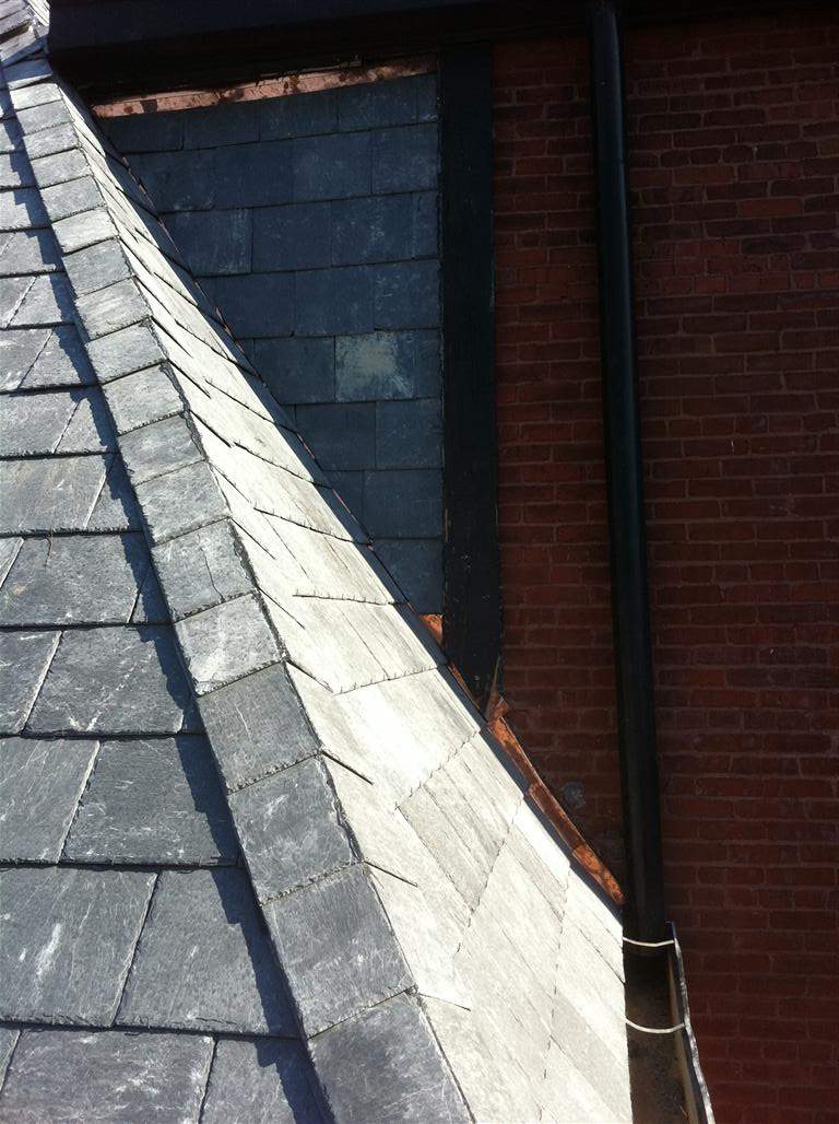 Historic Building ROOF REPLACEMNT with GAF TruSlate  on steep slop and Versico 60mil TPO on flat roof by Gorilla Exteriors Contracting, LLC