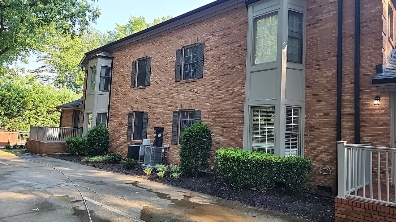 building clean using cleaner by Power Wash Masters LLC
