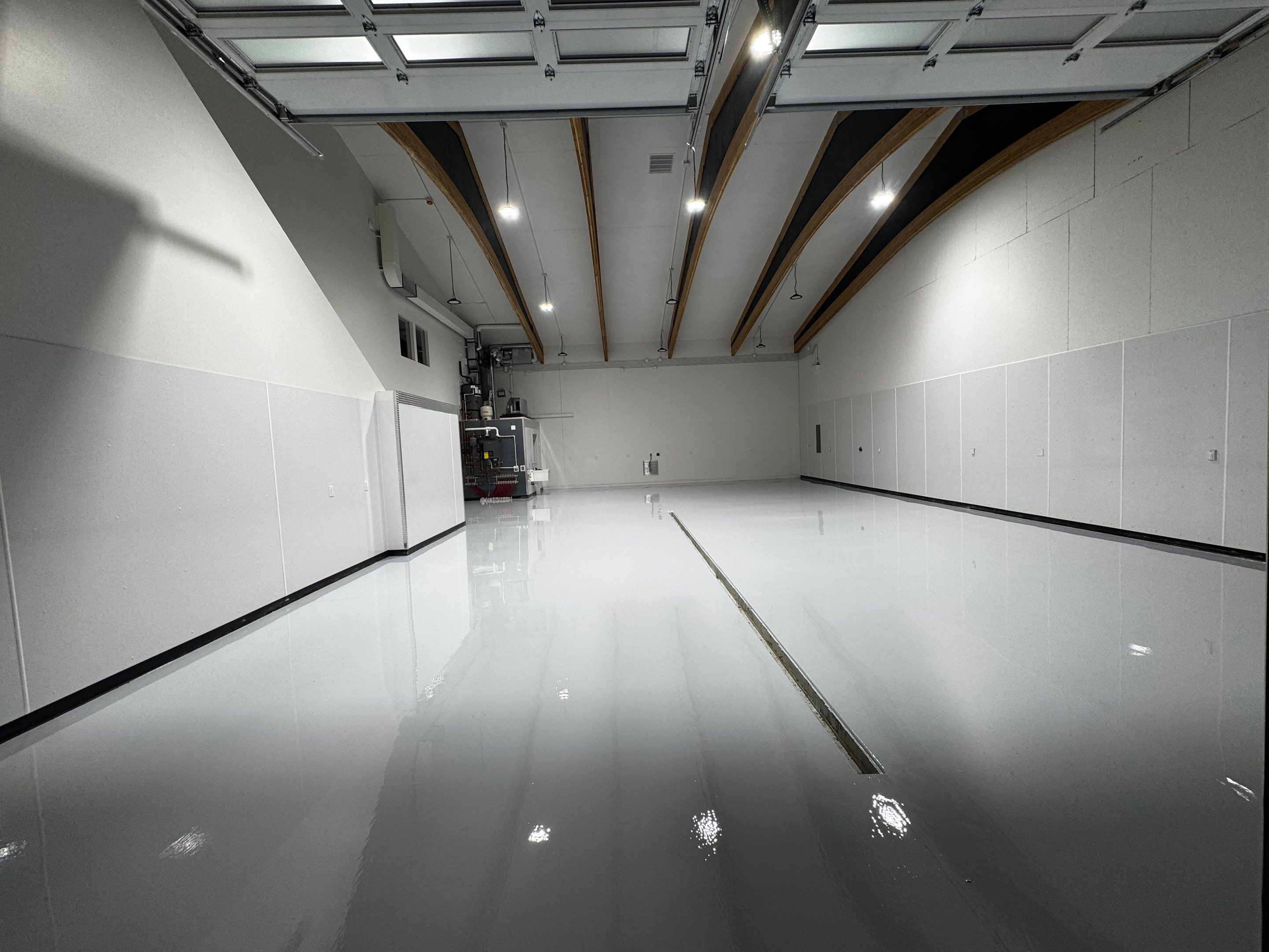 Colfax Commercial Shop Transformation With Vapor Mitigating Floor Coatings by Croc Coatings, LLC