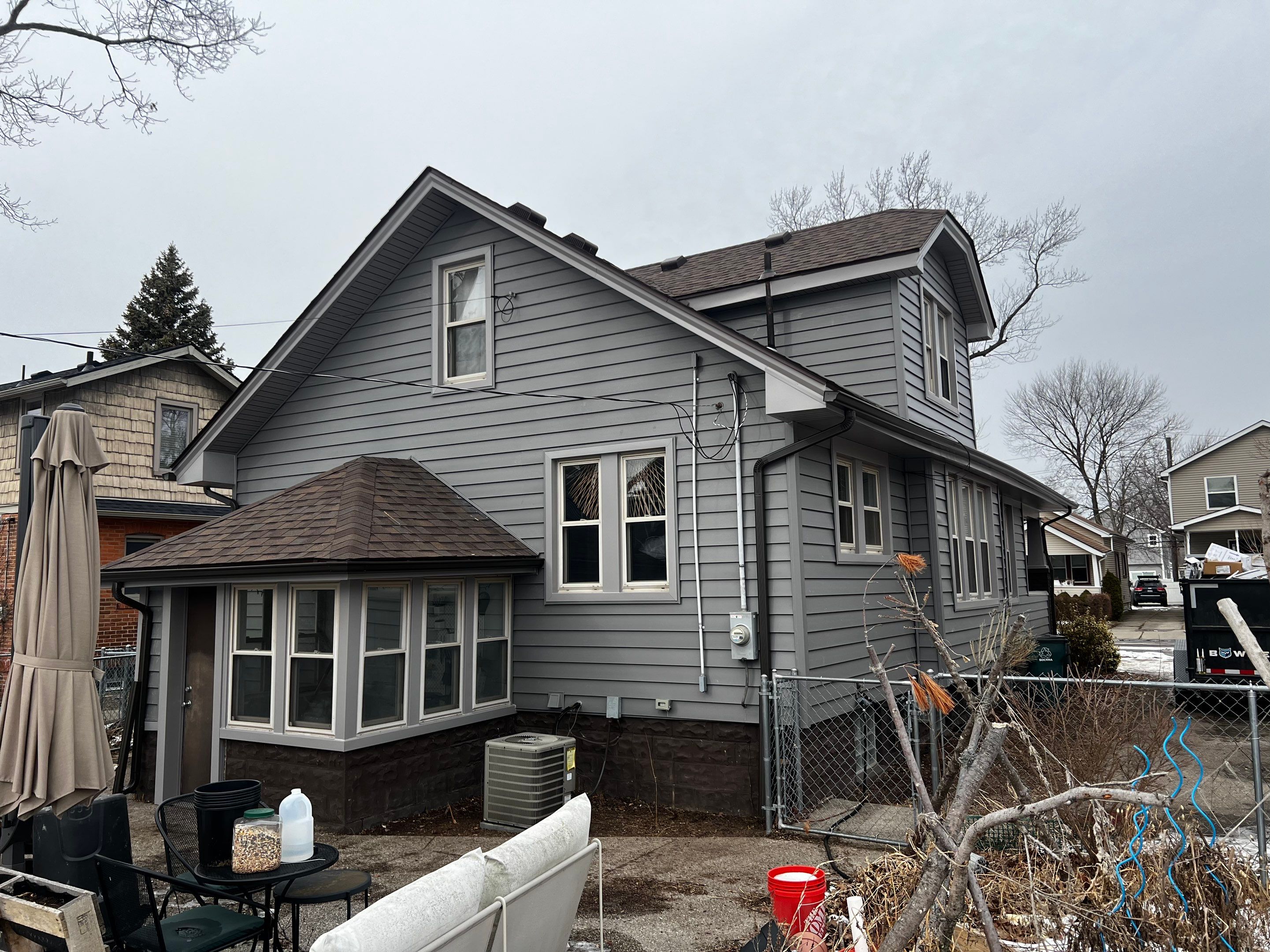 Vinyl Siding Replacement by Bloomfield Construction & Restoration