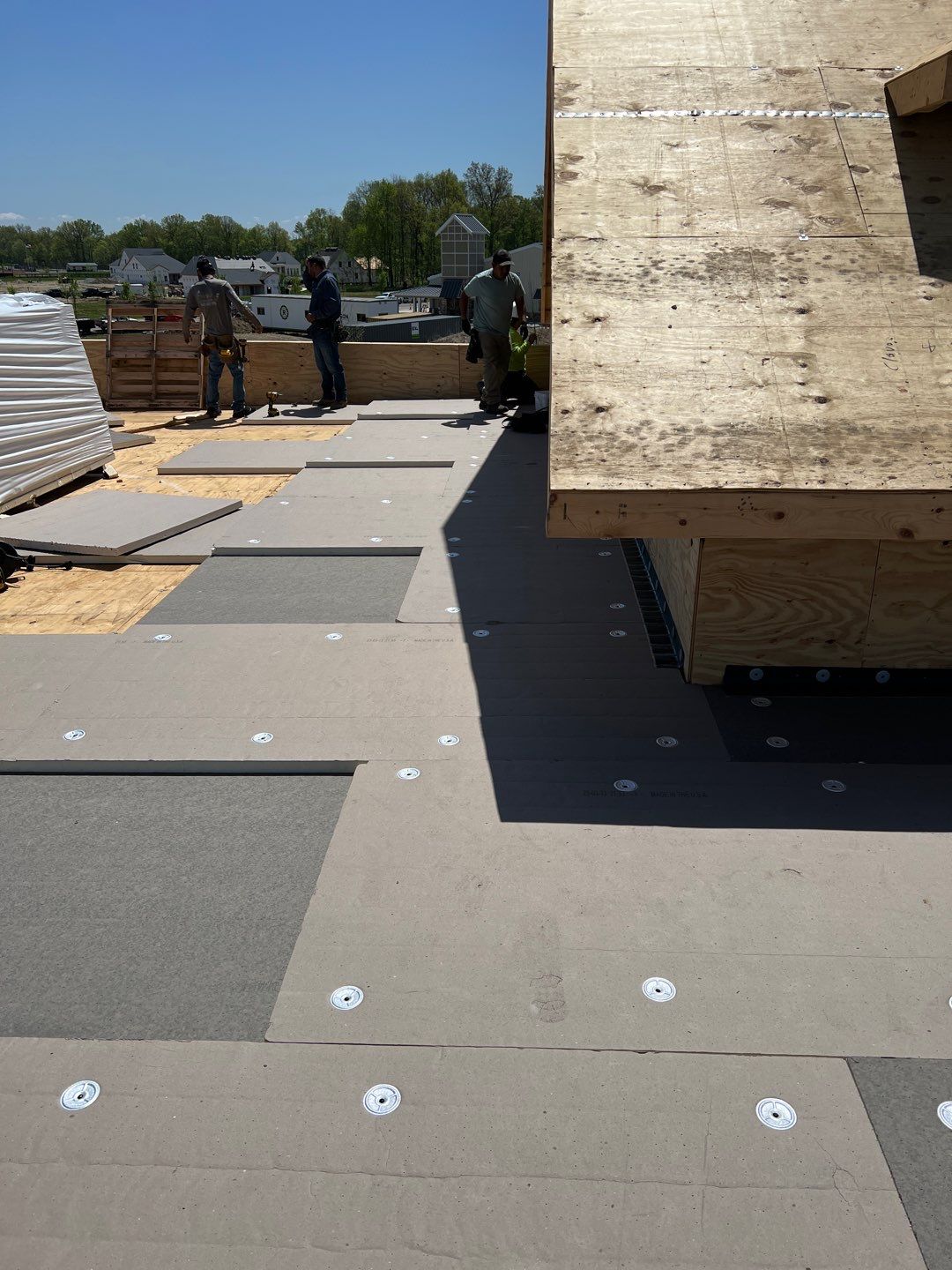 Commercial Roofing Installation using 60 mil rubber roof  by Nitro Roofing and Construction