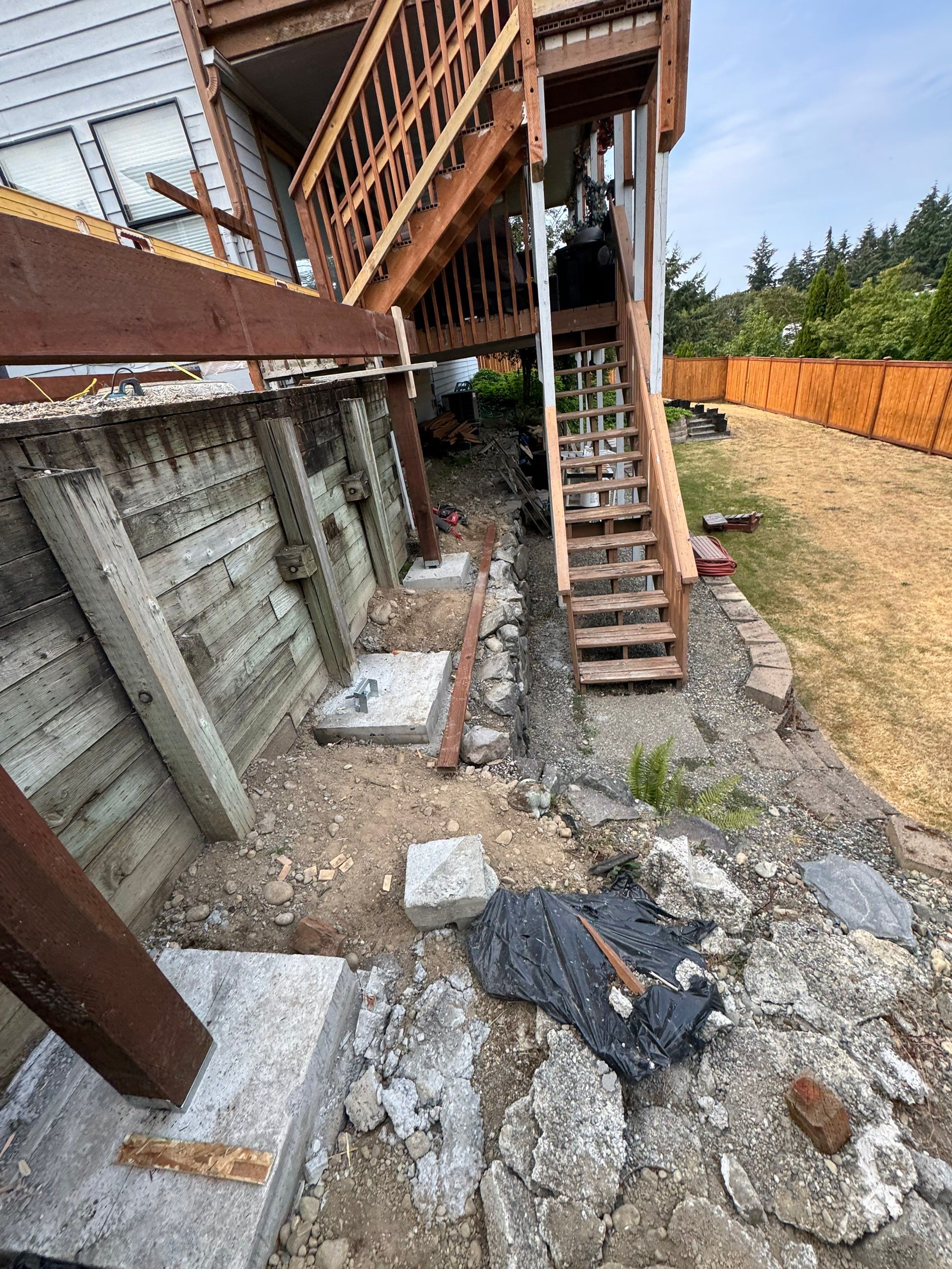 Tacoma Custom Composite Deck and Hot Tub Surround with Retaining Wall by Emerald City Energy 