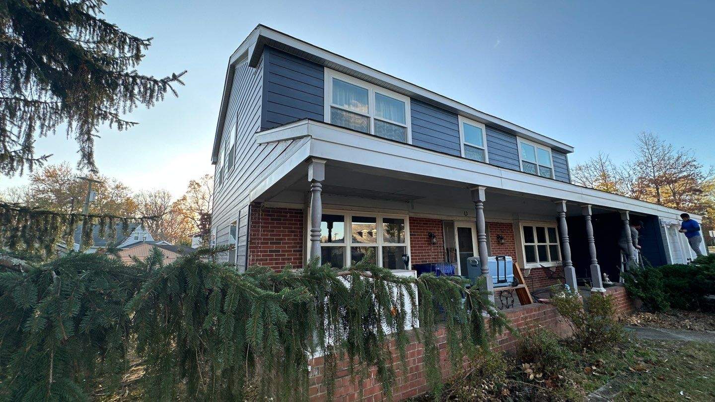 Siding Installation using JH Plank Select Cedarmill Eased Edge by ExteriorPros